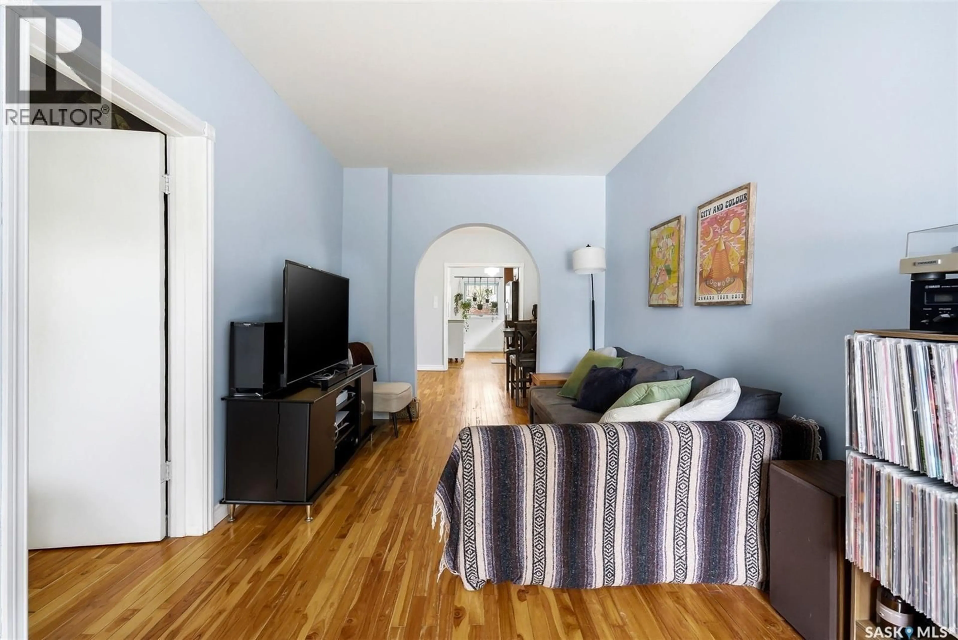 Living room with furniture, wood/laminate floor for 2264 MCTAVISH STREET, Regina Saskatchewan S4T3X2