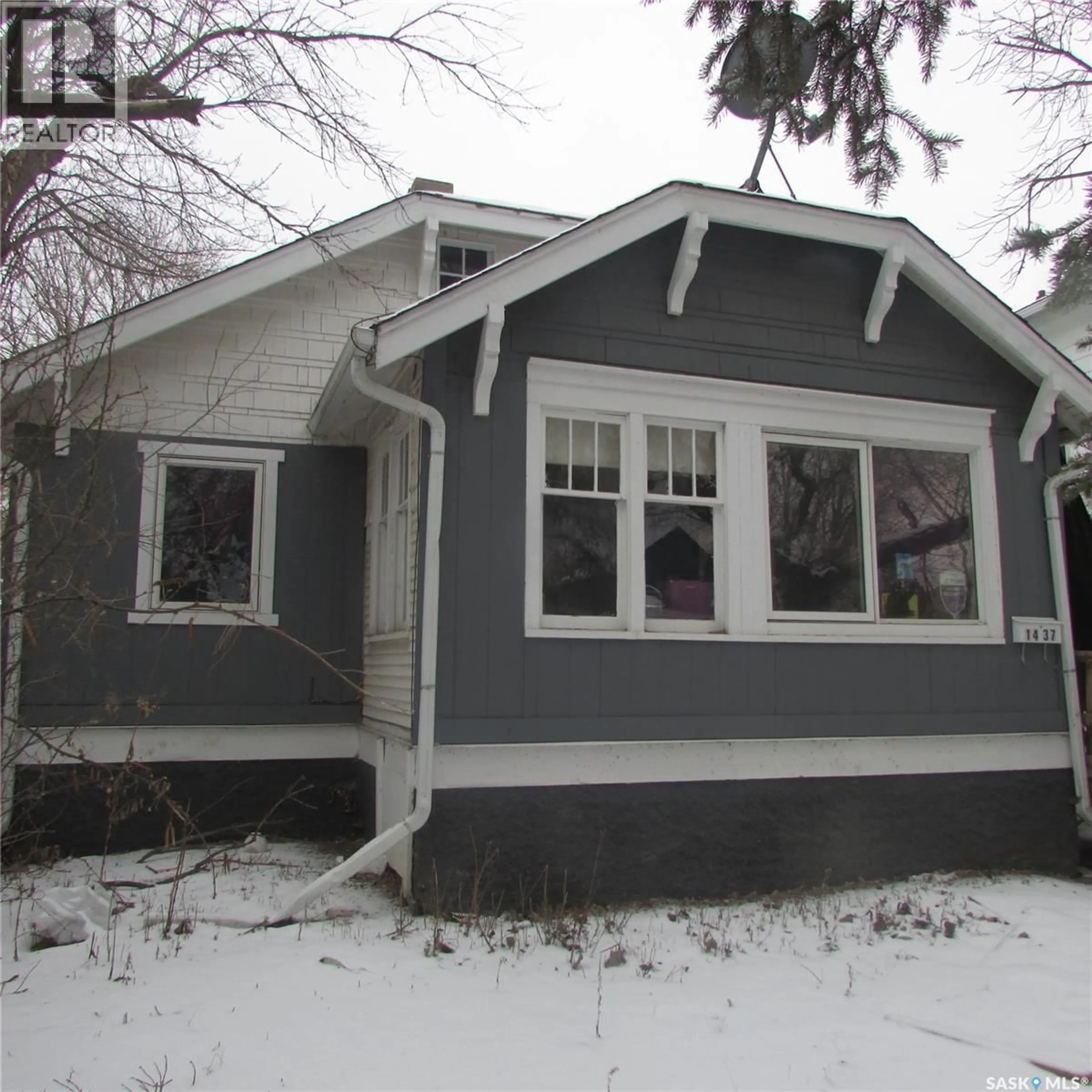 Home with vinyl exterior material, street for 1437 ELPHINSTONE STREET, Regina Saskatchewan S4T3M7
