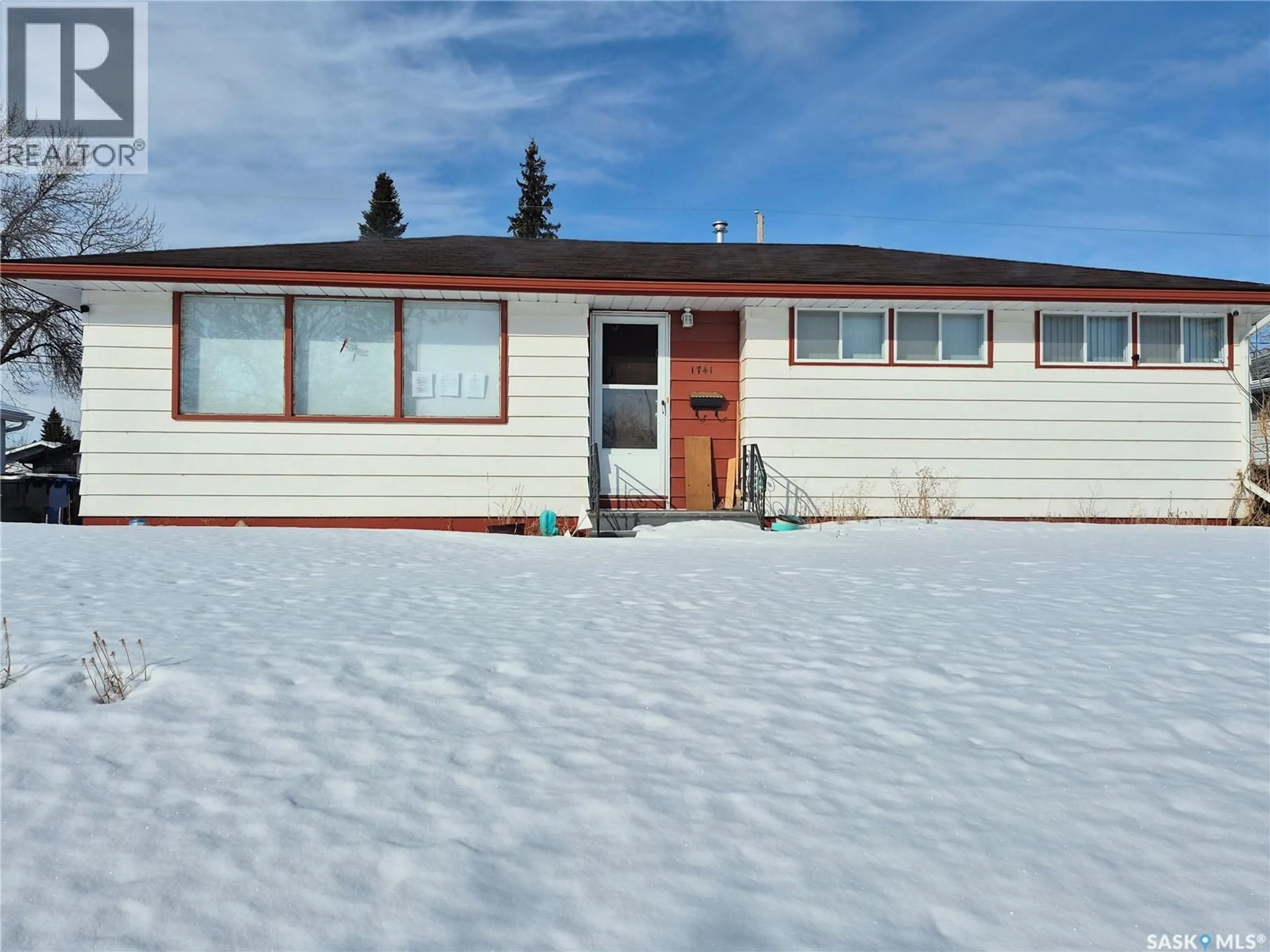 Home with vinyl exterior material, street for 1741 92ND STREET, North Battleford Saskatchewan S9A0B5