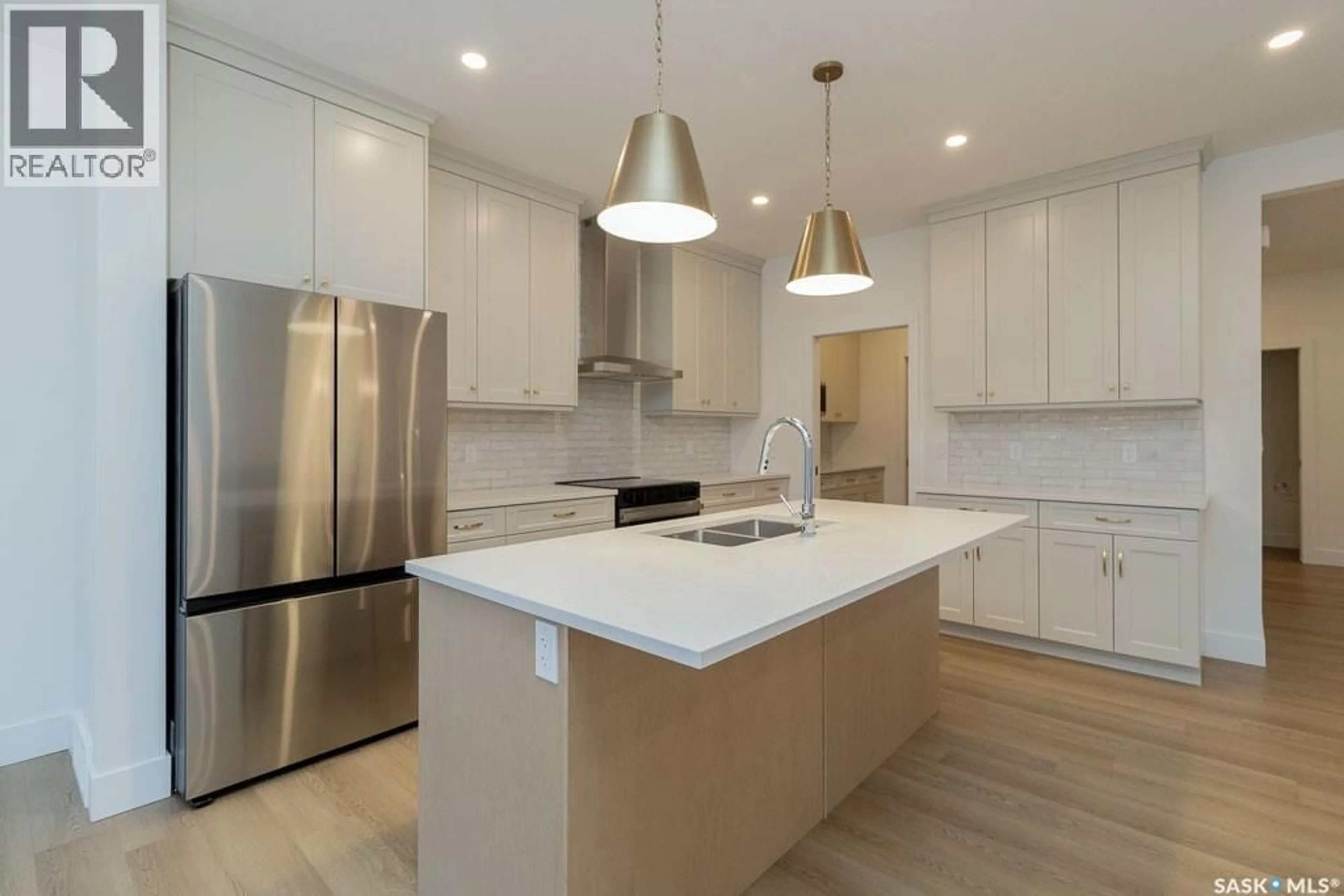 Open concept kitchen, unknown for 150 MAZUREK CRESCENT, Saskatoon Saskatchewan S7V1S1