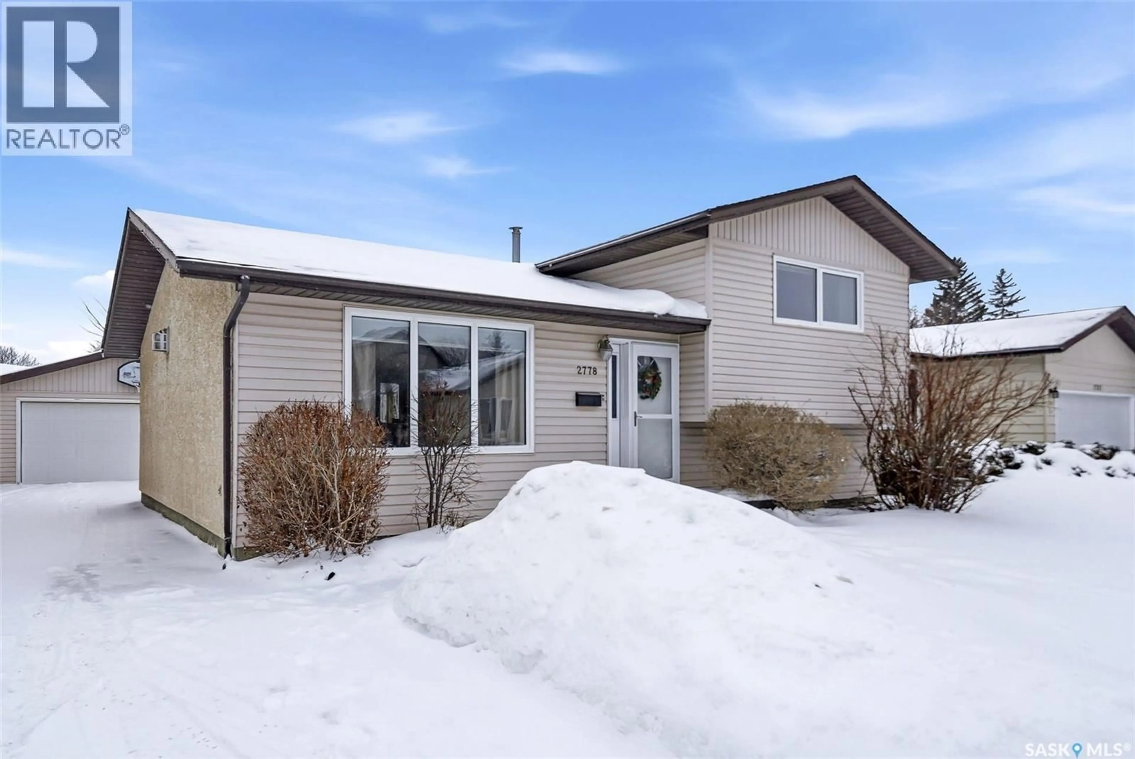 Home with vinyl exterior material, street for 2778 SCHWEITZER DRIVE, Regina Saskatchewan S4V1C5