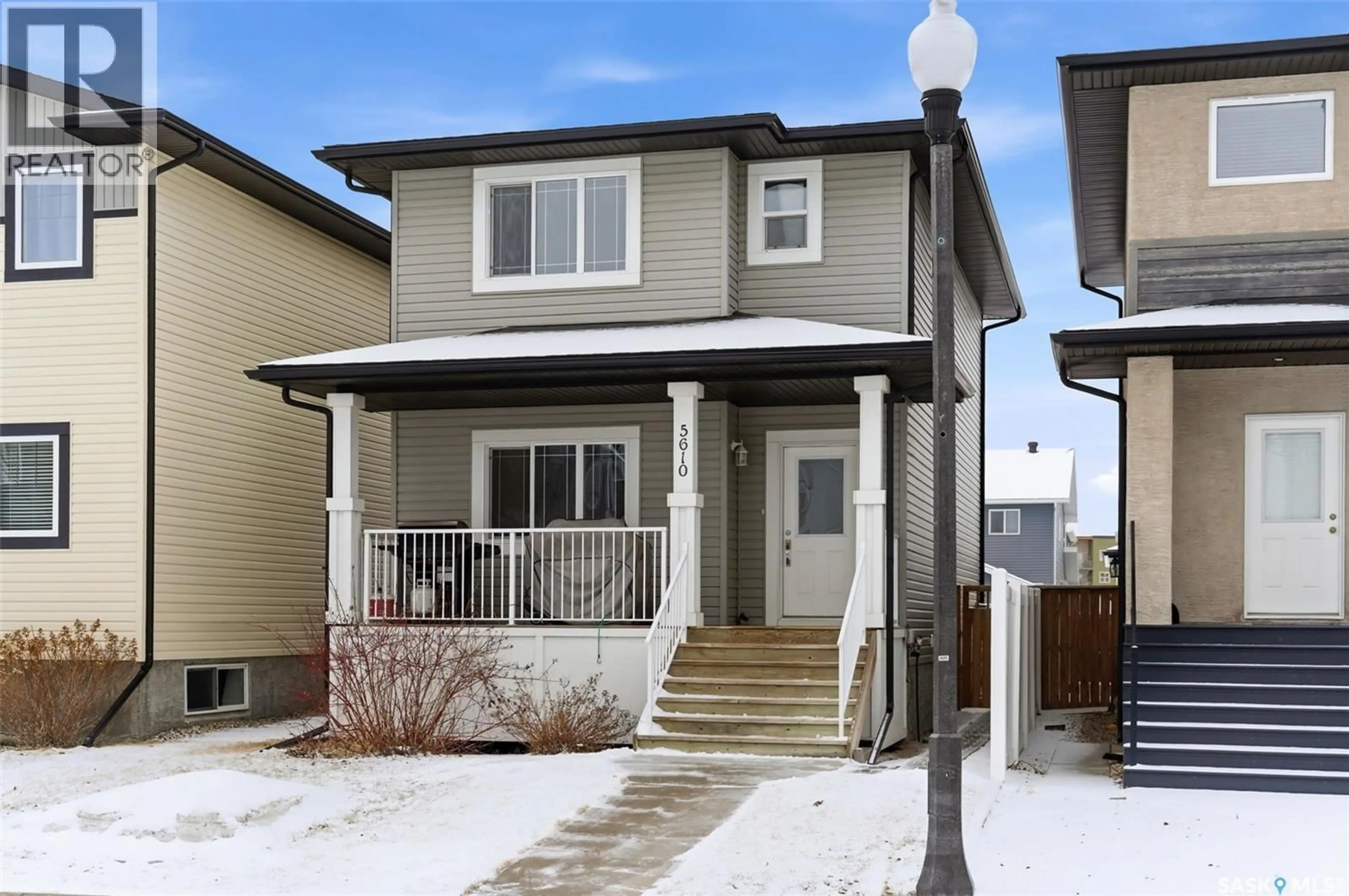 Home with vinyl exterior material, street for 5610 CAMPLING AVENUE, Regina Saskatchewan S4W0P7