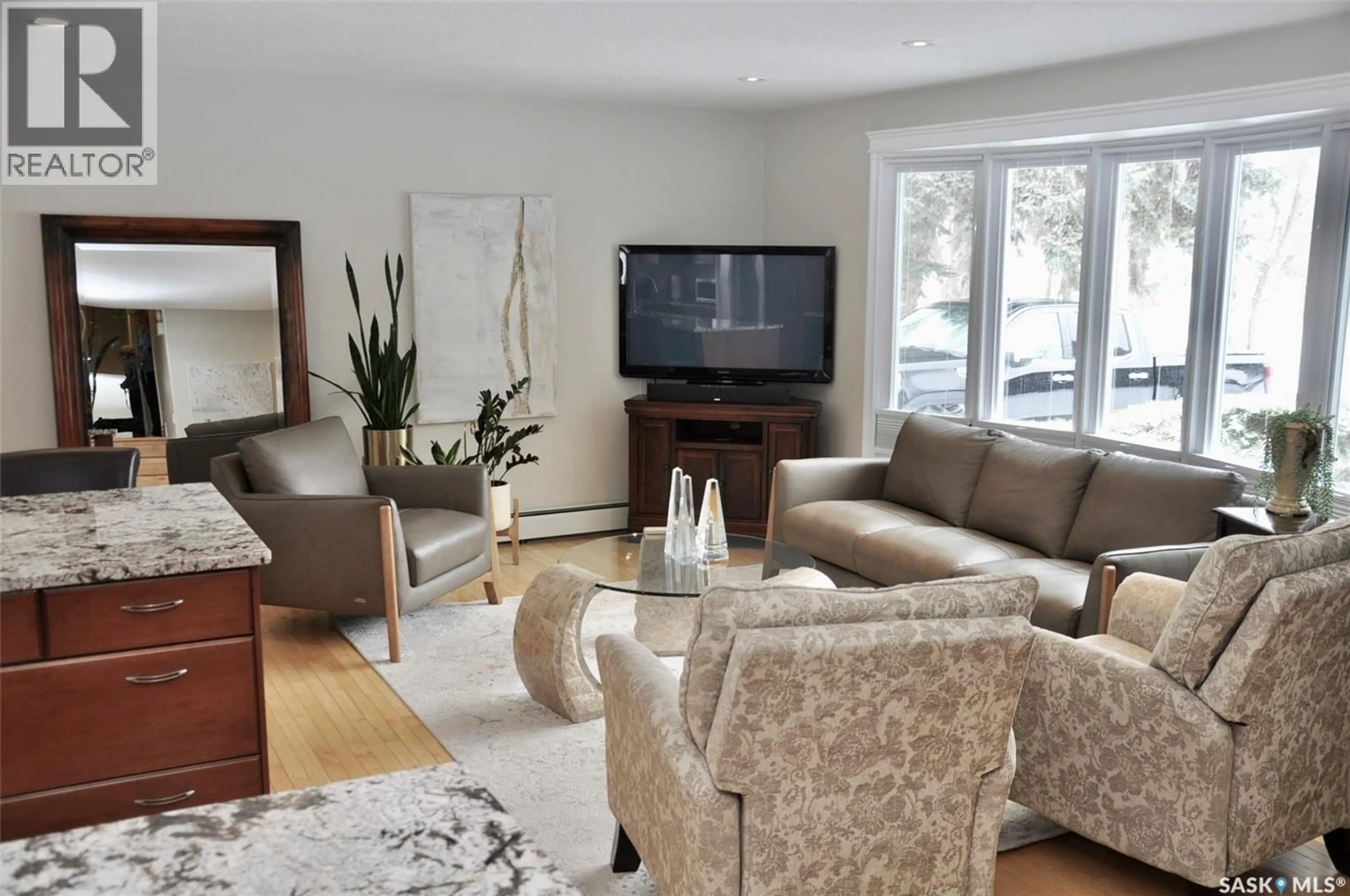 Living room with furniture, unknown for 3606 BALFOUR COURT, Saskatoon Saskatchewan S7H4B2