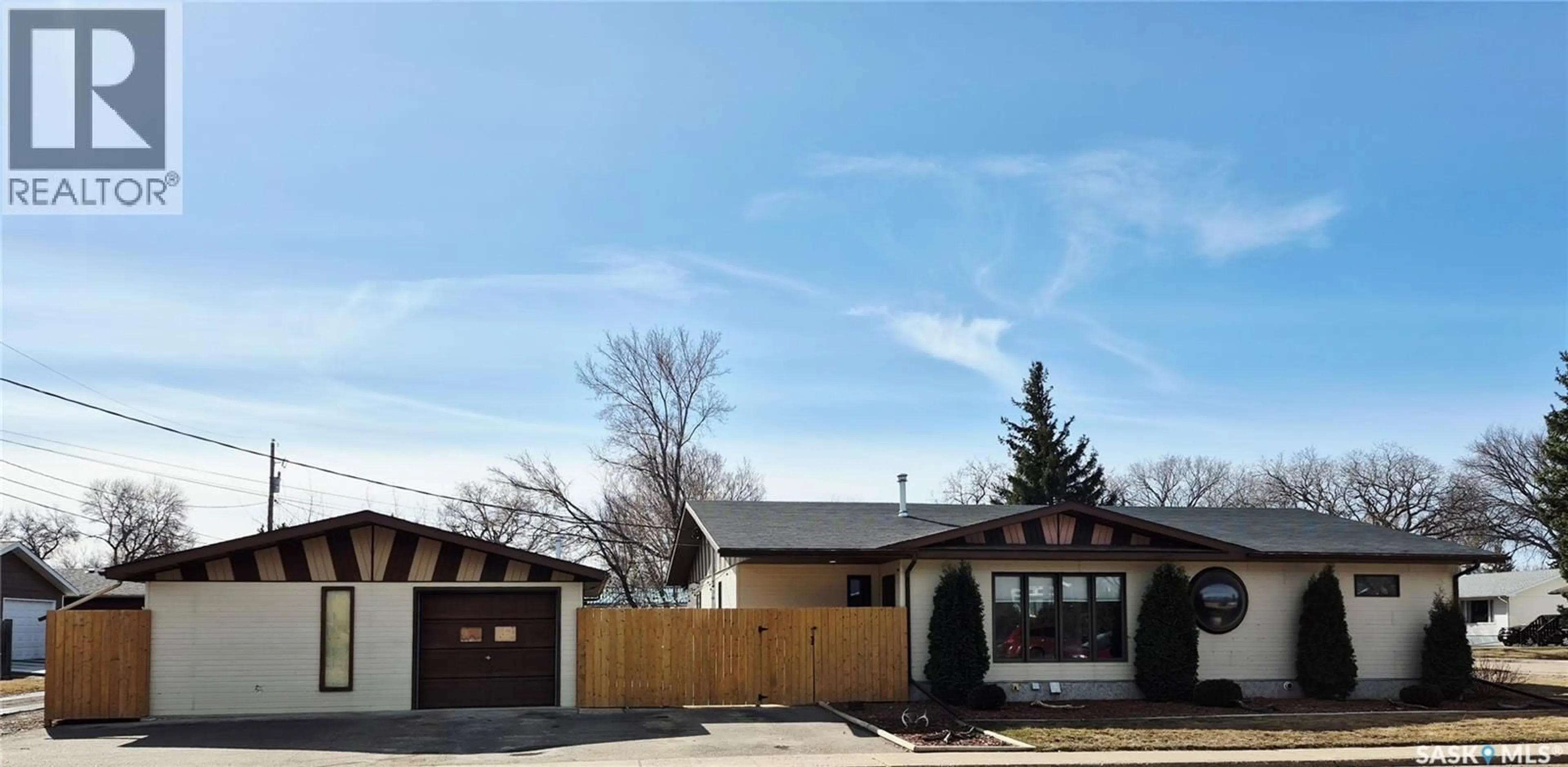 Home with brick exterior material, street for 409 5TH AVENUE, Swift Current Saskatchewan S9H3N5
