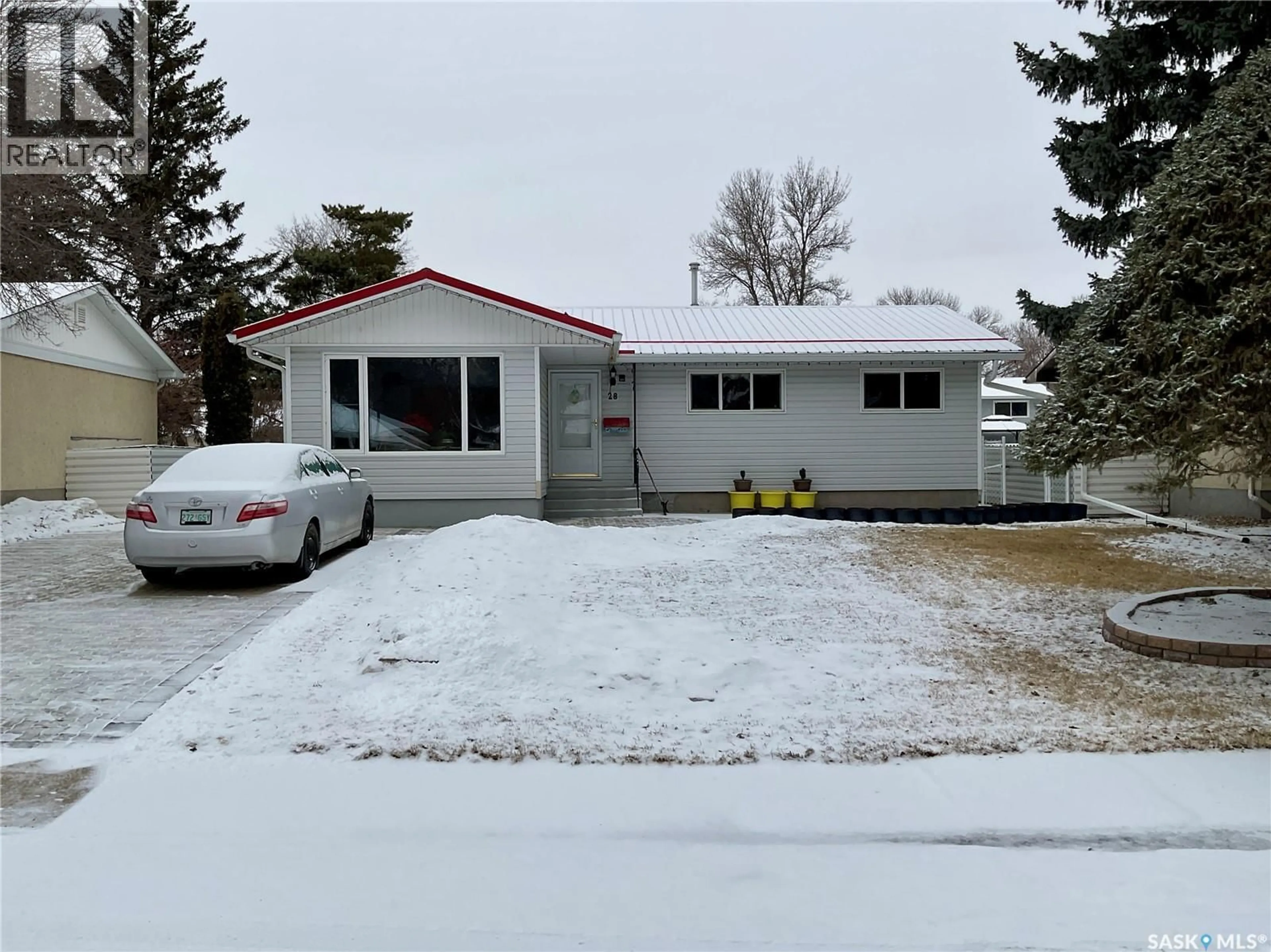 A pic from outside/outdoor area/front of a property/back of a property/a pic from drone, street for 28 MATHESON CRESCENT, Regina Saskatchewan S4R5C4