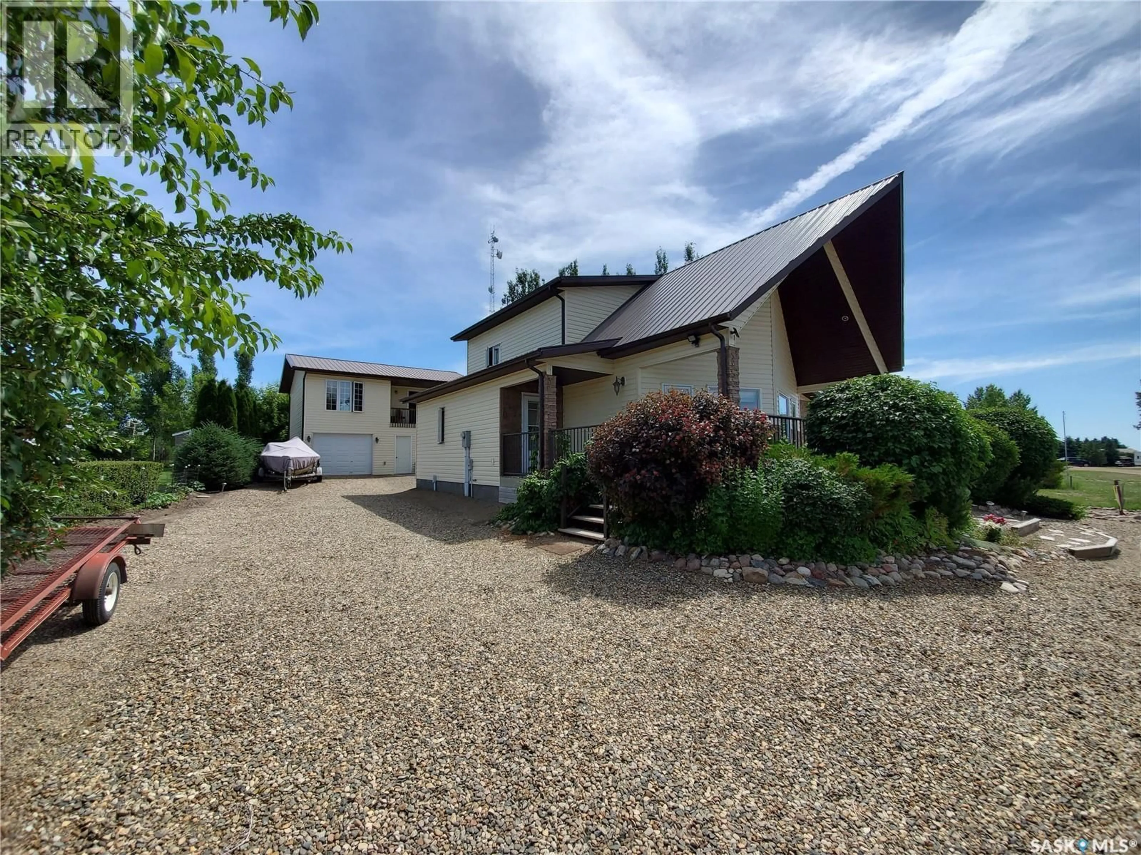 A pic from outside/outdoor area/front of a property/back of a property/a pic from drone, building for 325 RUBY DRIVE, Coteau Rm No. 255 Saskatchewan S0L0G0