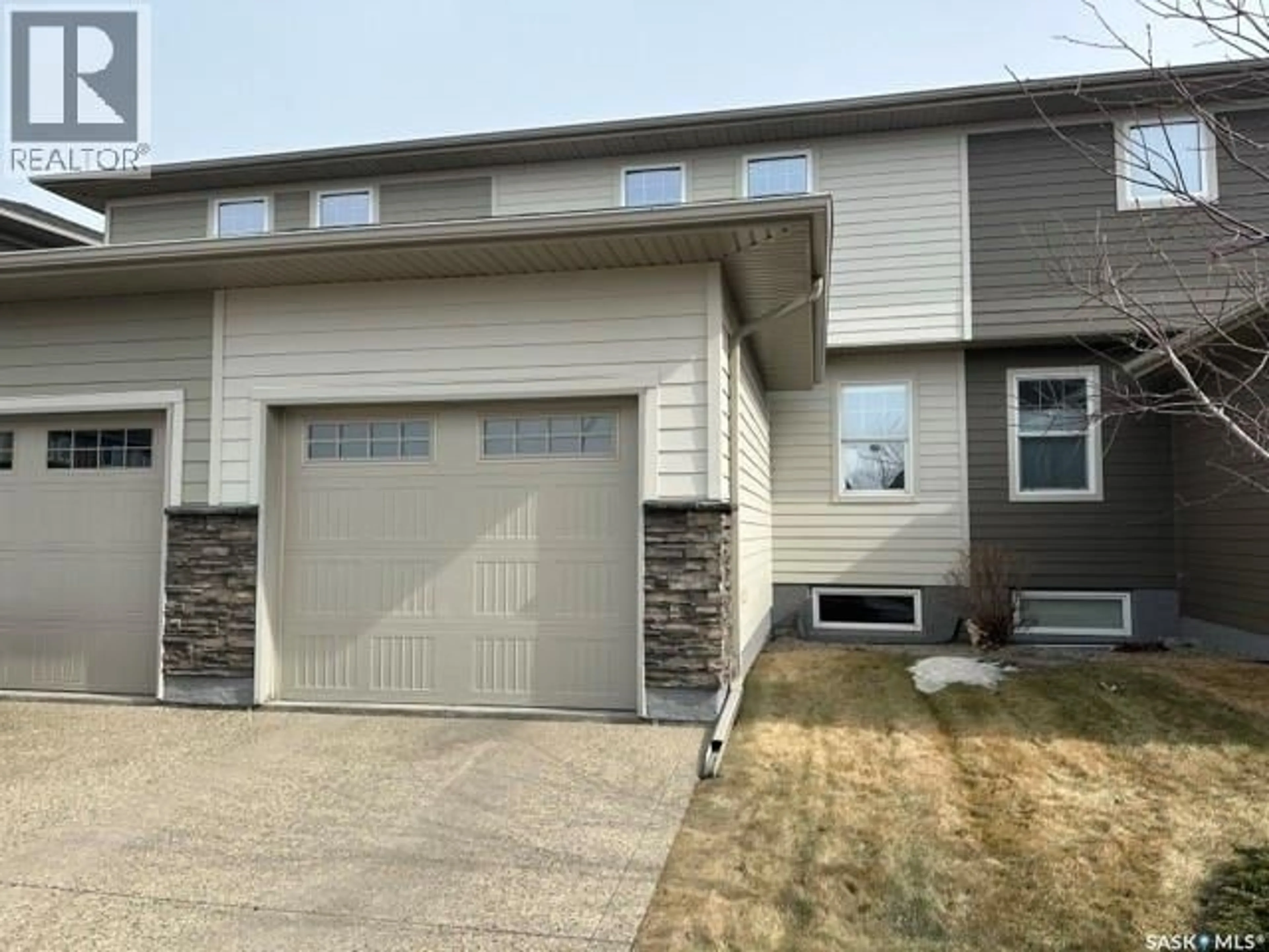 Home with vinyl exterior material, street for 4542 HARBOUR LANDING DRIVE, Regina Saskatchewan S4W0C1