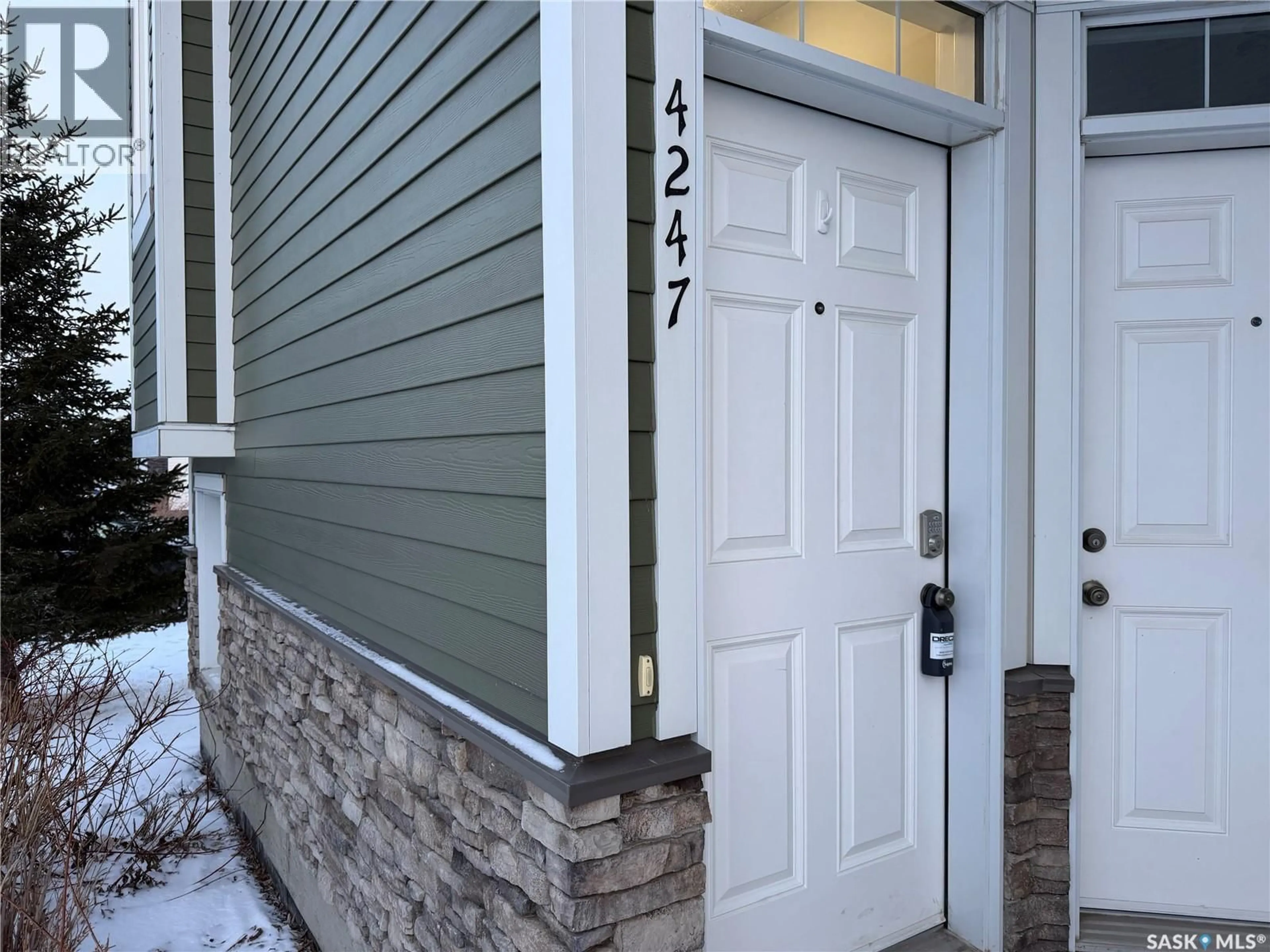 Home with vinyl exterior material, street for E - 4247 GREEN APPLE DRIVE, Regina Saskatchewan S4V1S1