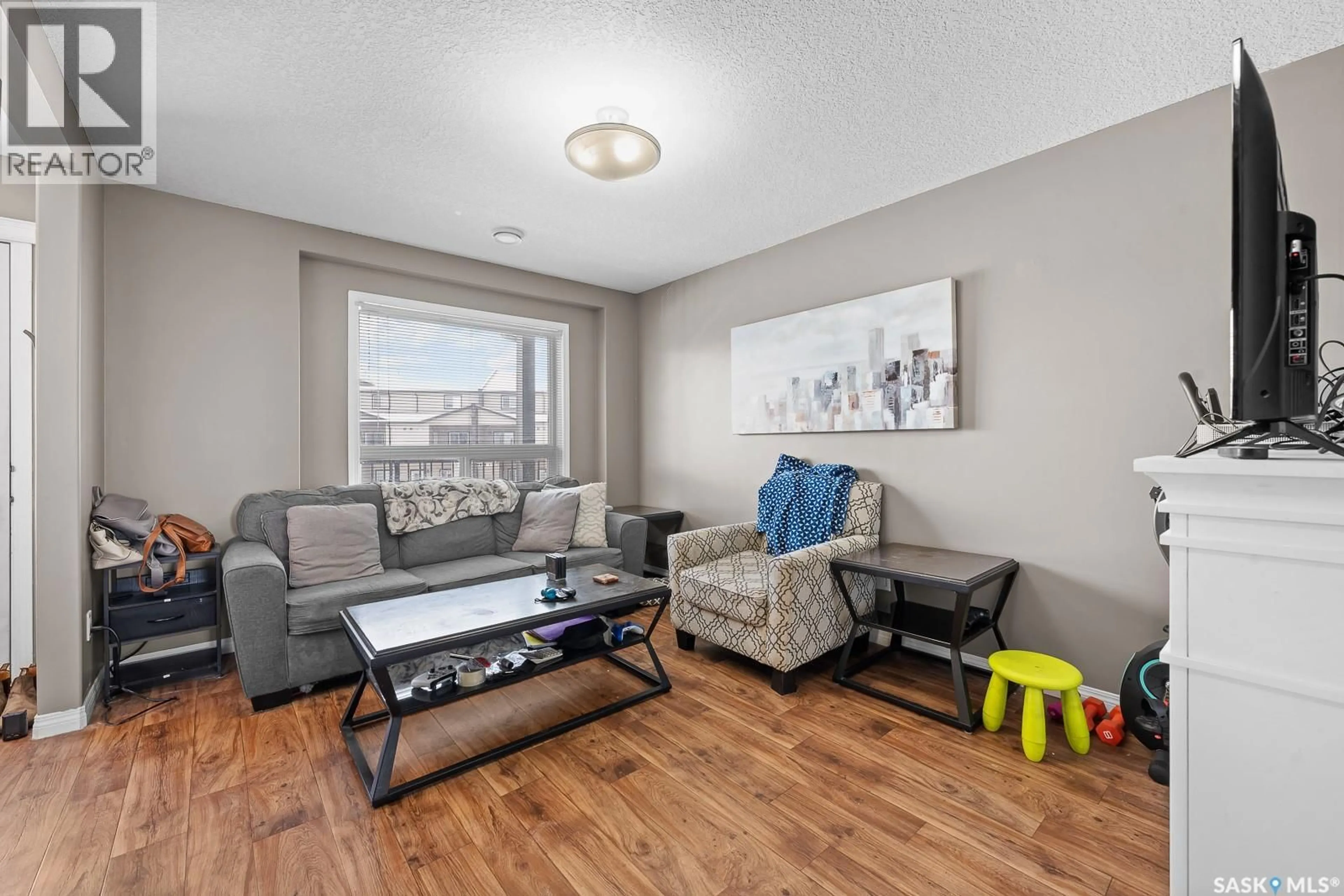 Living room with furniture, unknown for 3826 - 411 DEWDNEY AVENUE, Regina Saskatchewan S4Z0A6