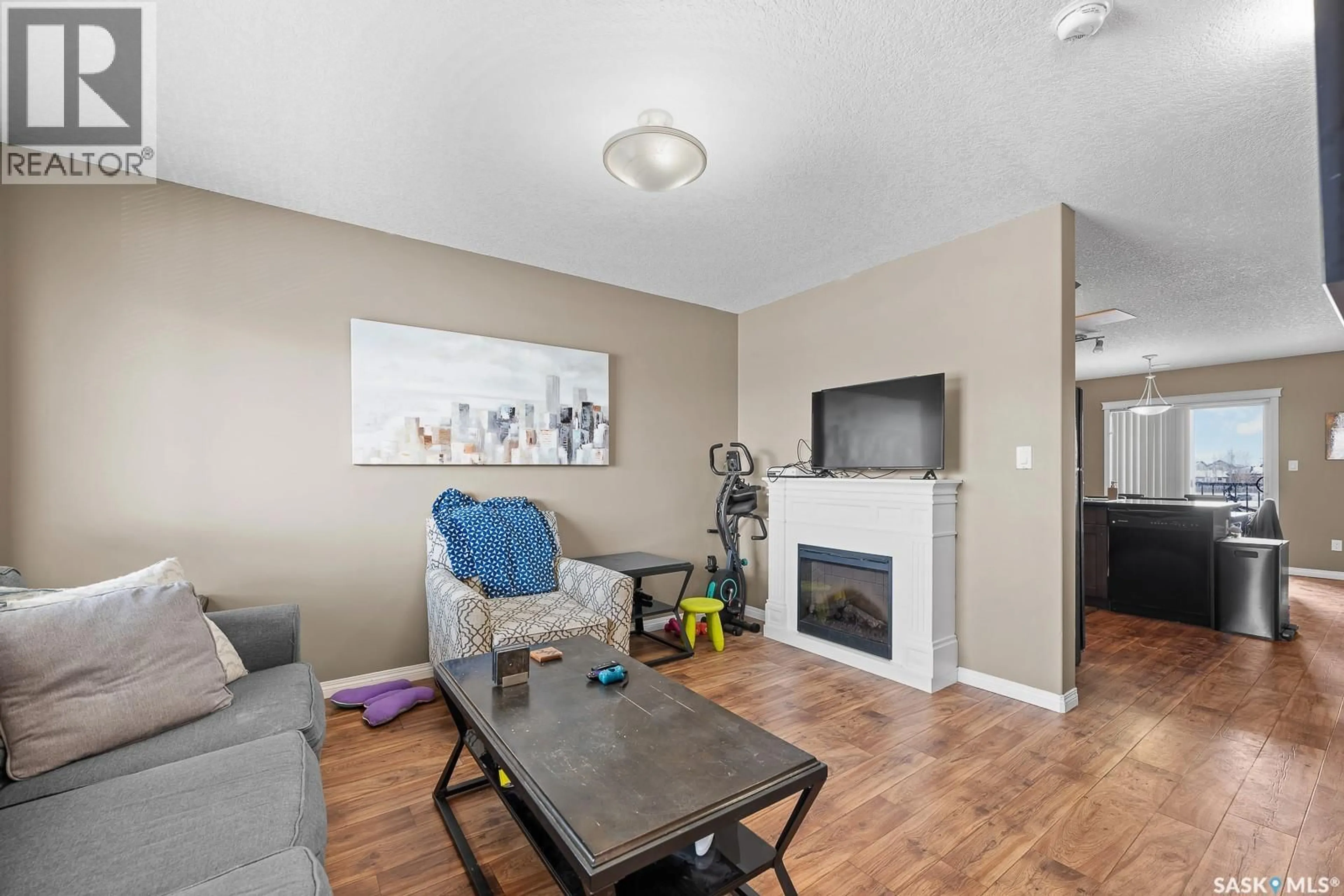 Living room with furniture, unknown for 3826 - 411 DEWDNEY AVENUE, Regina Saskatchewan S4Z0A6