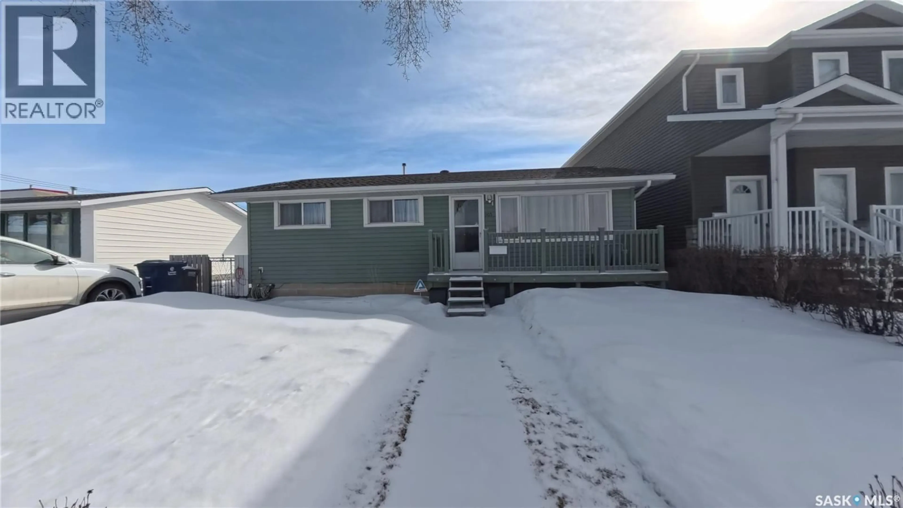 Home with vinyl exterior material, street for 105 113TH STREET, Saskatoon Saskatchewan S7N1V8