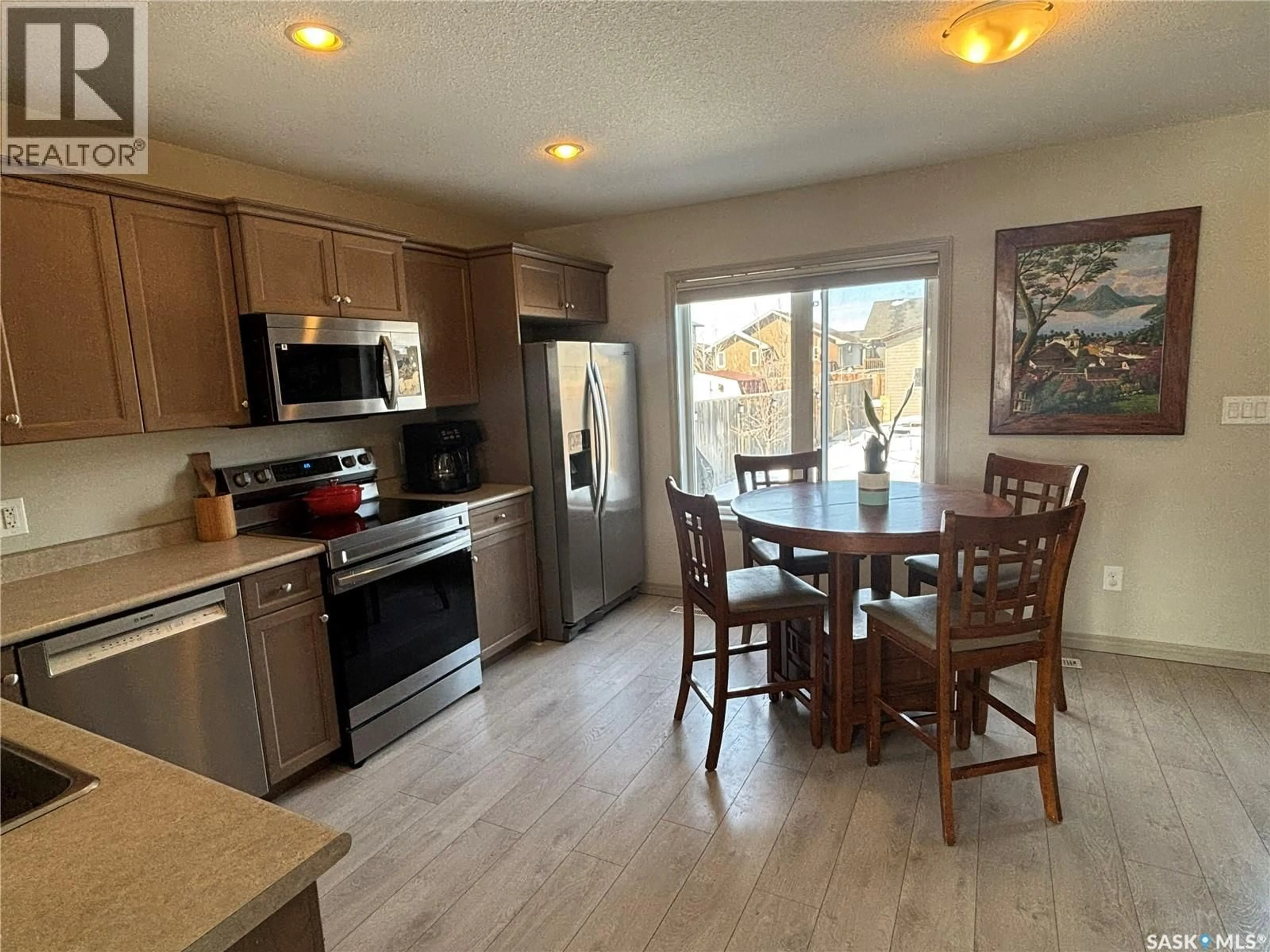 Open concept kitchen, unknown for 919 GLENVIEW COVE, Martensville Saskatchewan S0K0A2
