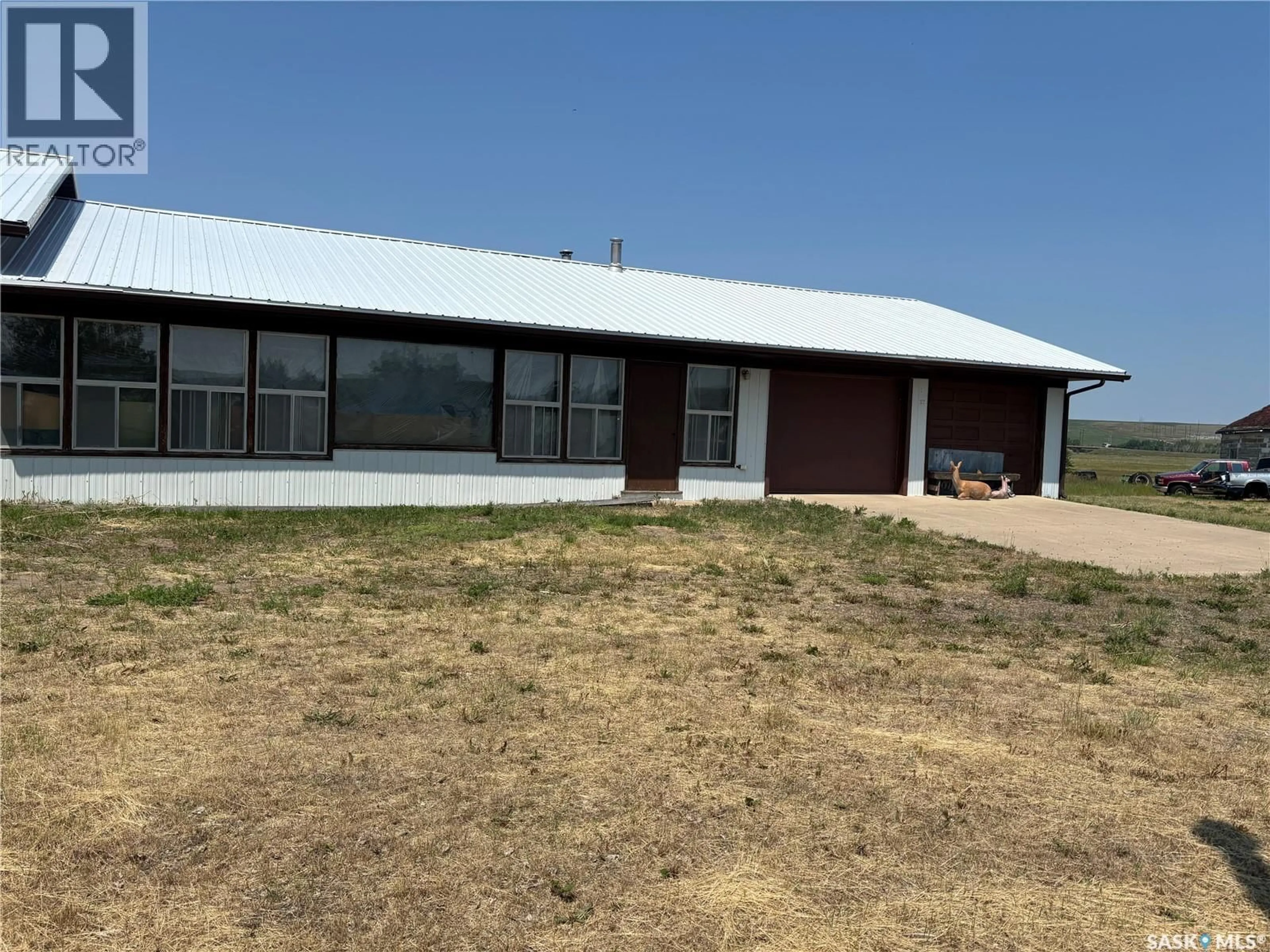 A pic from outside/outdoor area/front of a property/back of a property/a pic from drone, building for BARABE ACREAGE, Swift Current Rm No. 137 Saskatchewan S9H4X6