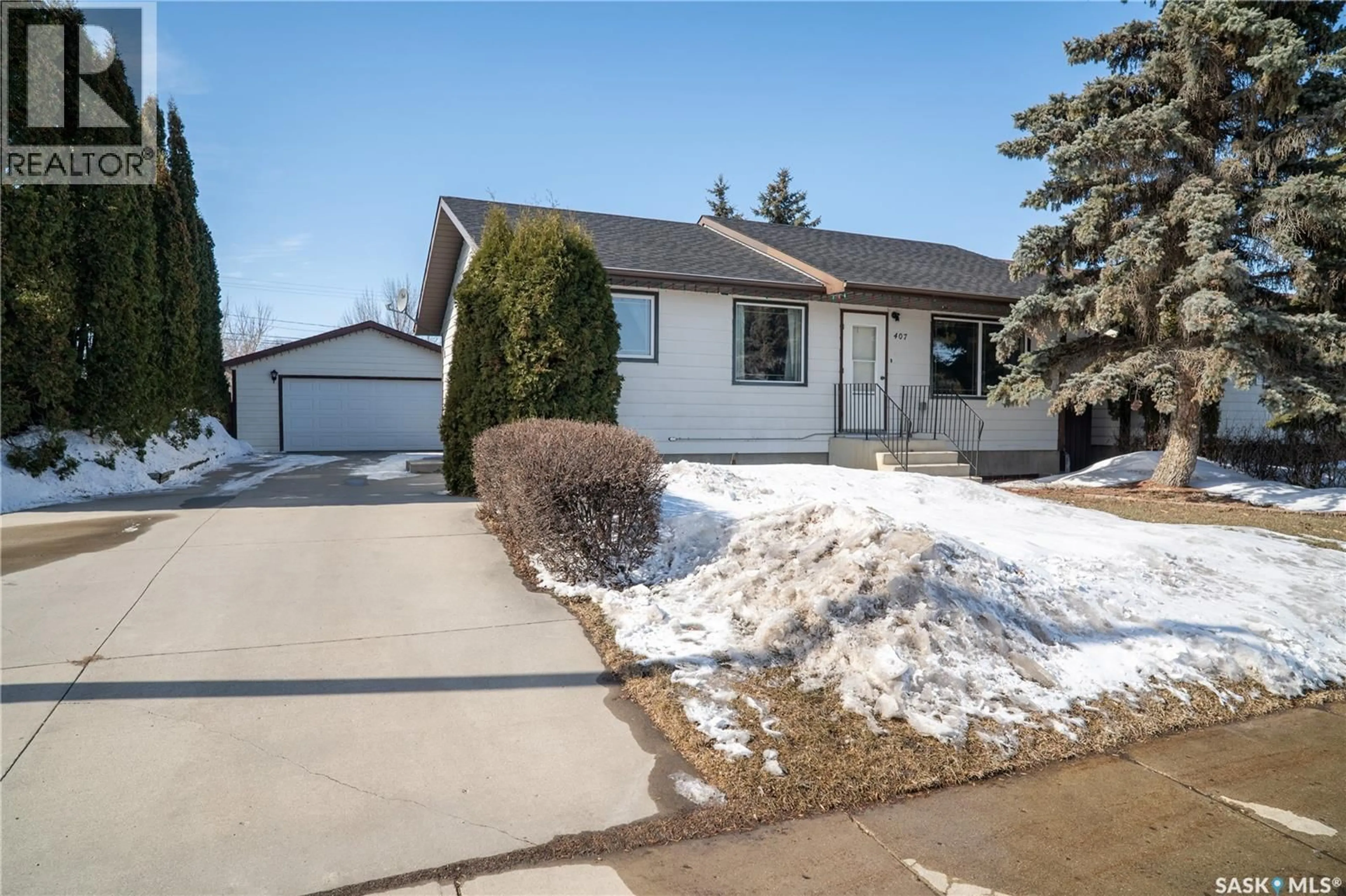 Home with vinyl exterior material, street for 407 8TH AVENUE, Warman Saskatchewan S0K4S0