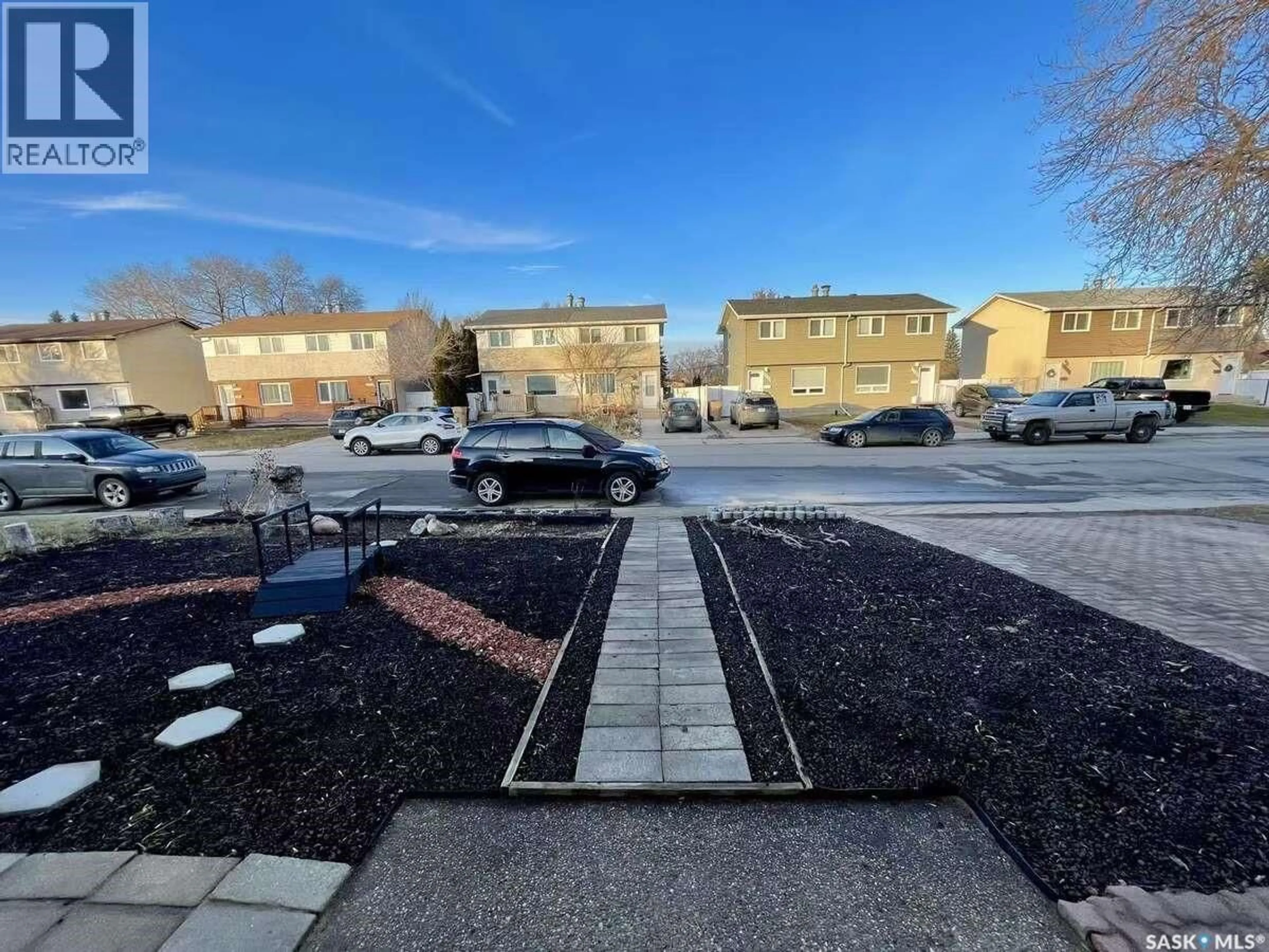A pic from outside/outdoor area/front of a property/back of a property/a pic from drone, street for 7227 6TH AVENUE, Regina Saskatchewan S4T0P3