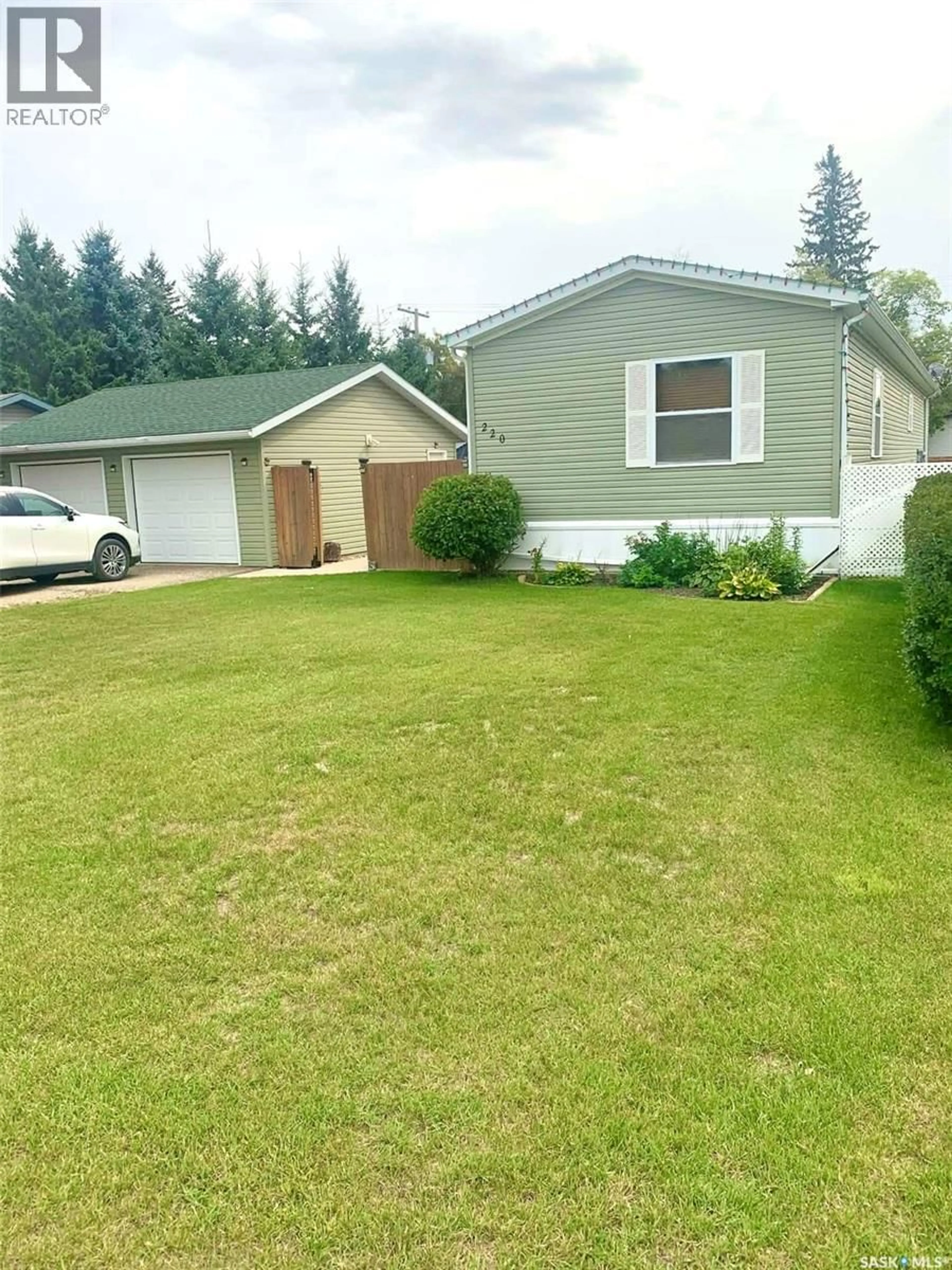 A pic from outside/outdoor area/front of a property/back of a property/a pic from drone, street for 220 FIFTH STREET, Bredenbury Saskatchewan S0A0H0