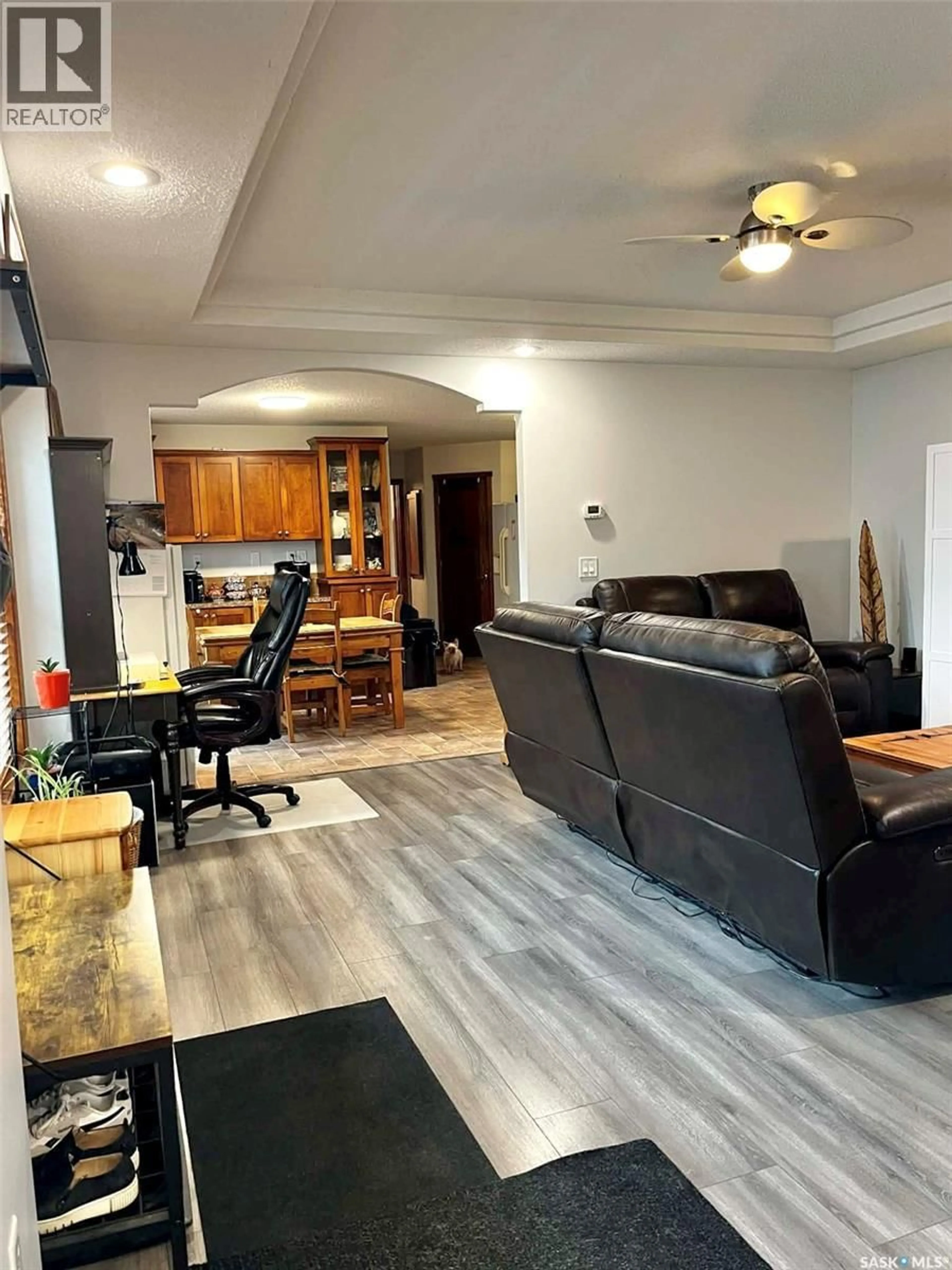 Living room with furniture, wood/laminate floor for 220 FIFTH STREET, Bredenbury Saskatchewan S0A0H0