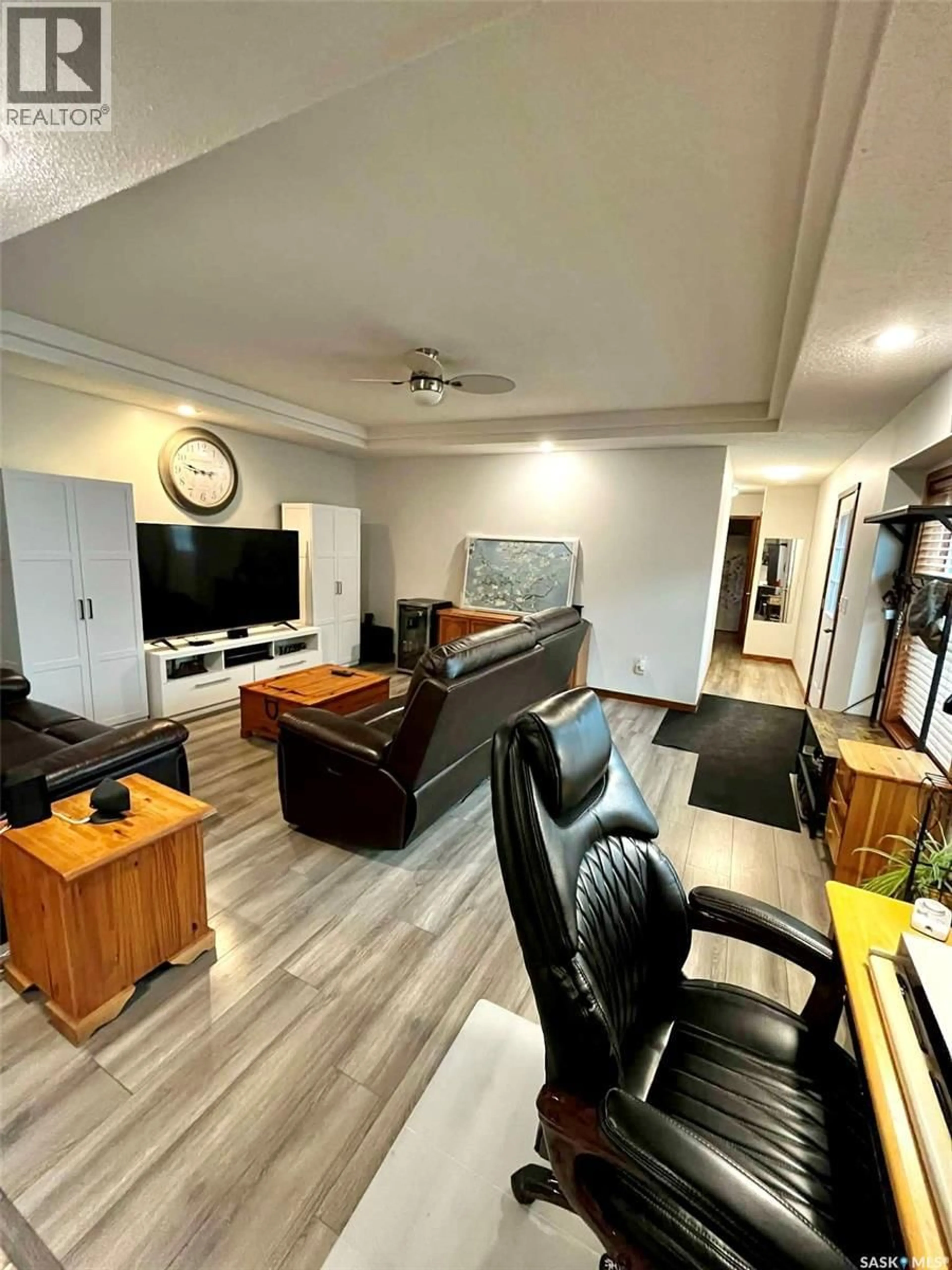 Living room with furniture, wood/laminate floor for 220 FIFTH STREET, Bredenbury Saskatchewan S0A0H0