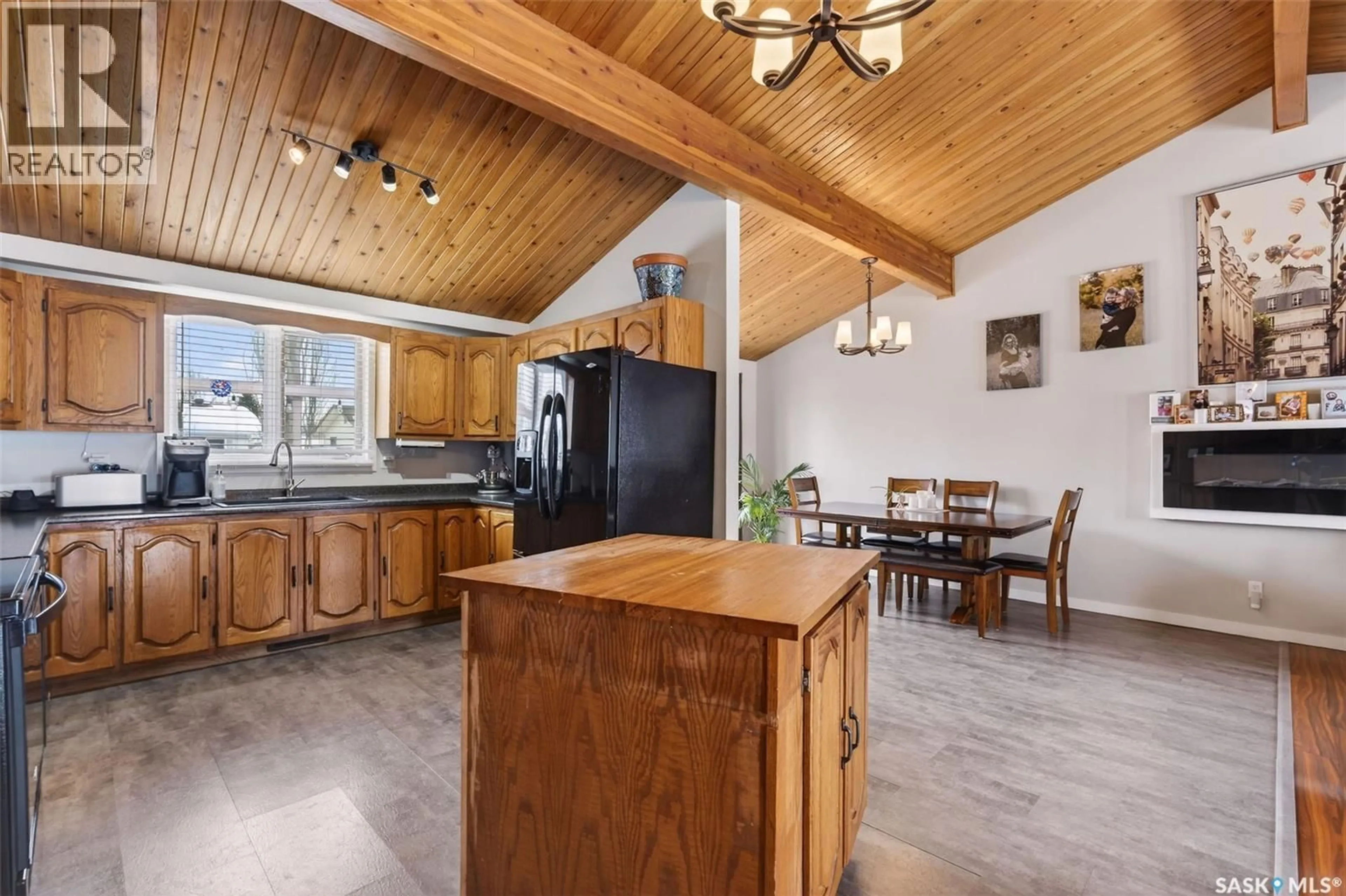 Open concept kitchen, wood/laminate floor for 3389 EAGLE CRESCENT, Prince Albert Saskatchewan S6V7N5