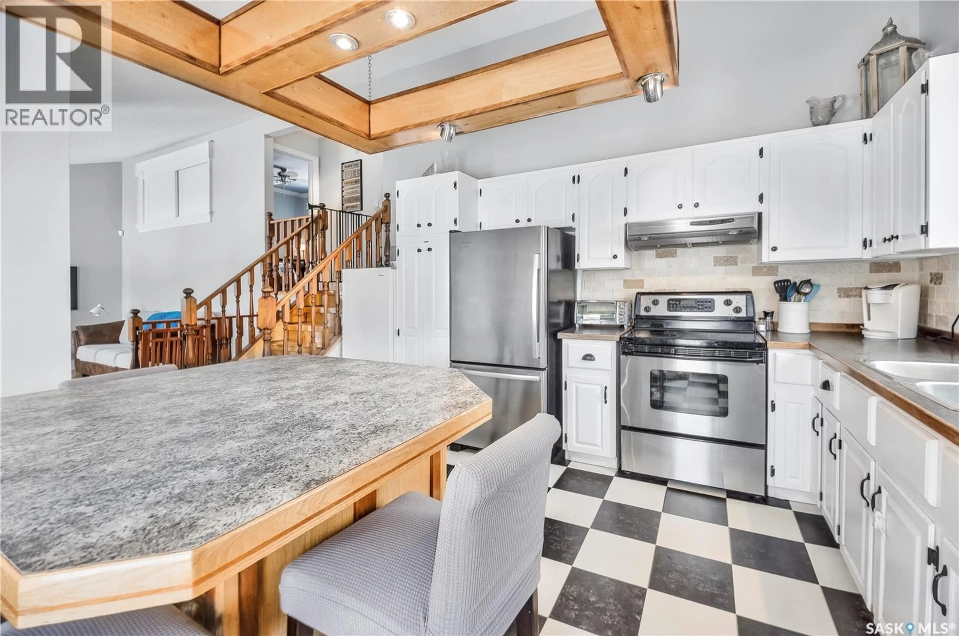 Open concept kitchen, ceramic/tile floor for 814 CARR PLACE, Prince Albert Saskatchewan S6V7E1