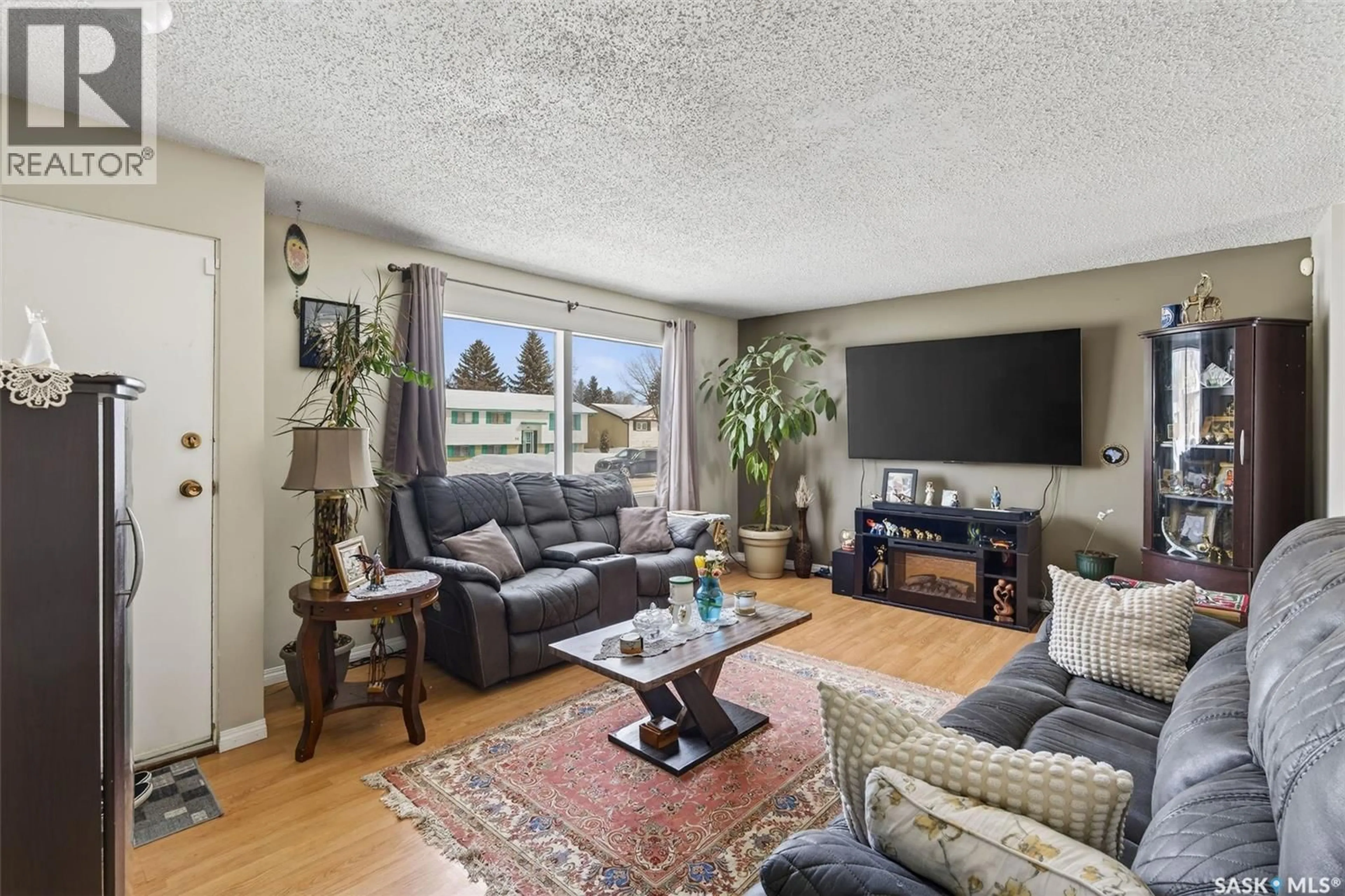 Living room with furniture, unknown for 555 32ND STREET, Prince Albert Saskatchewan S6V6B7