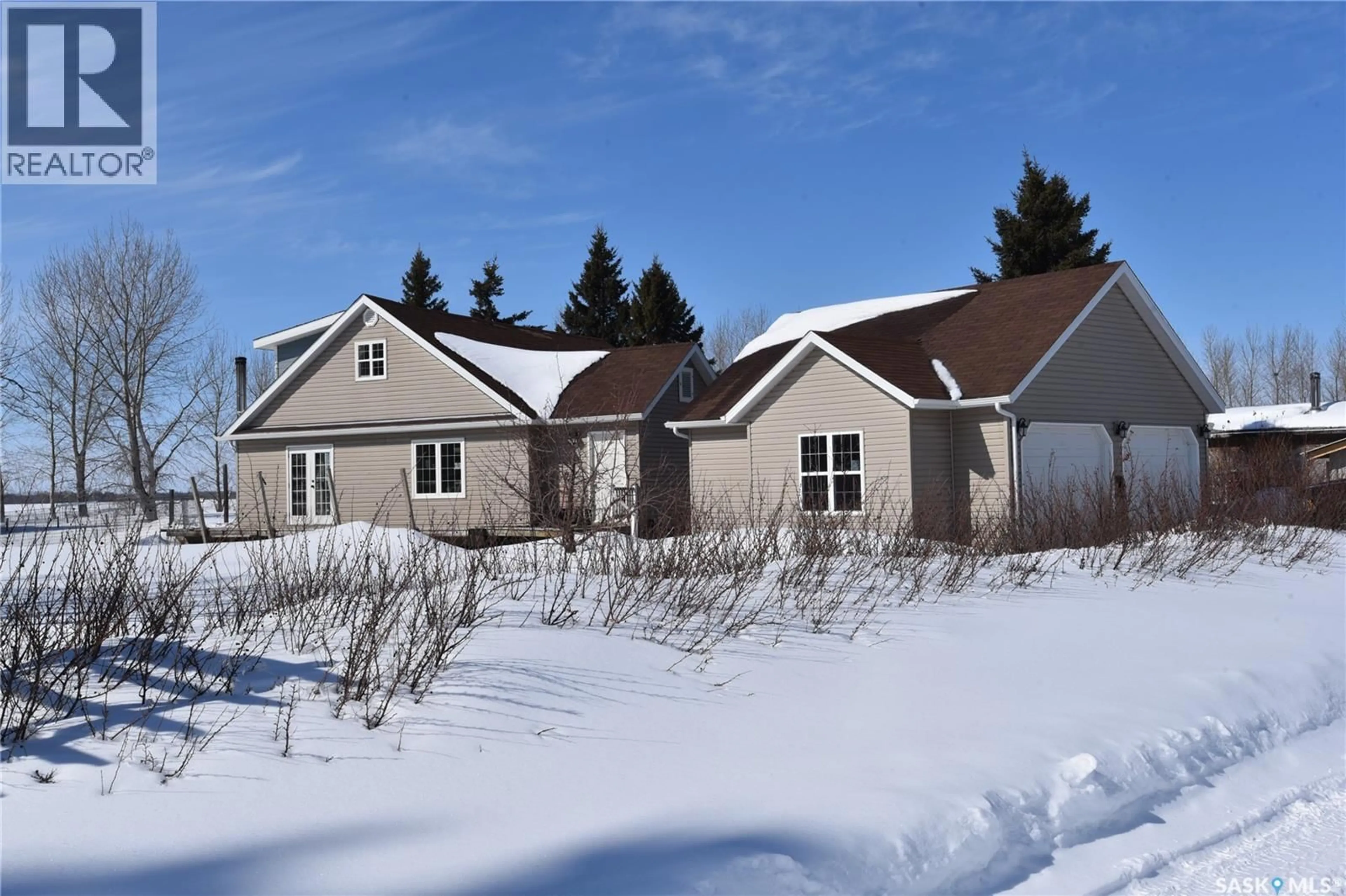 Home with vinyl exterior material, street for SAAKE ACREAGE, Torch River Rm No. 488 Saskatchewan S0E1E0