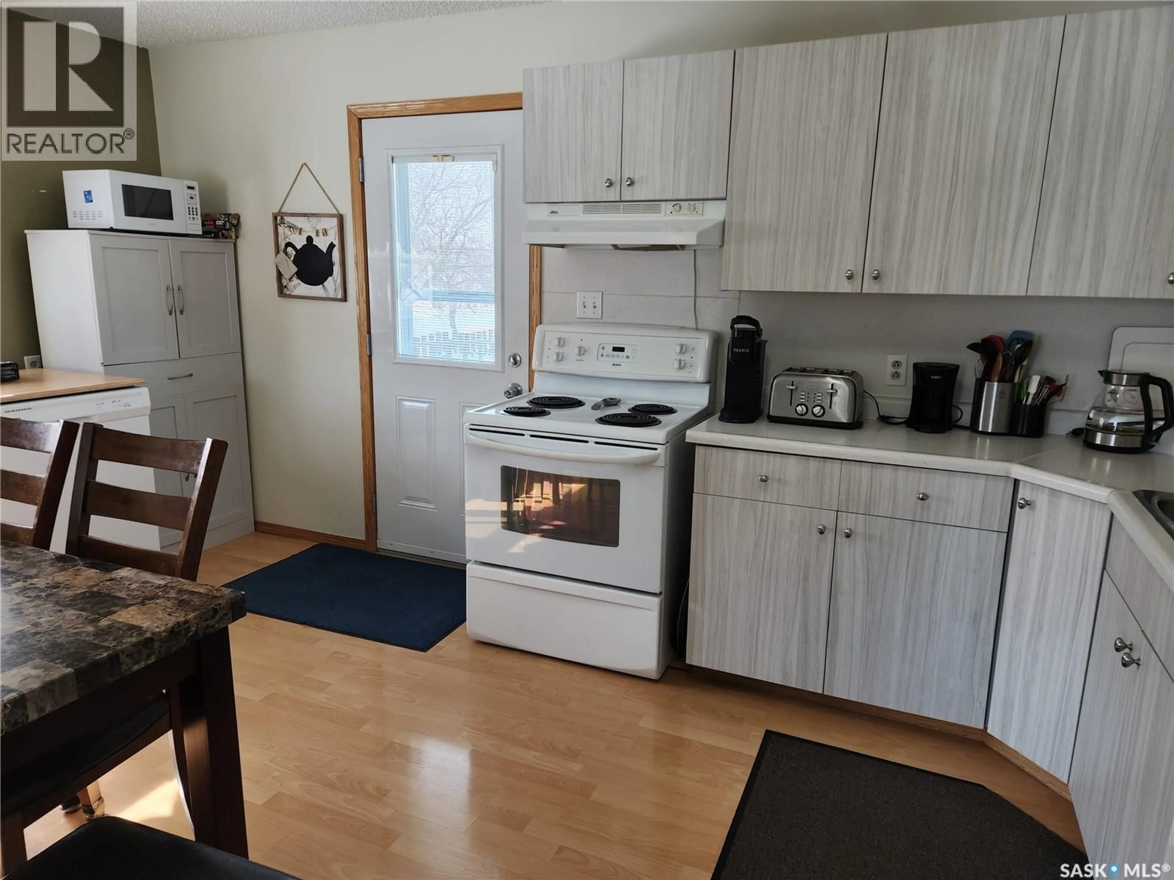 Standard kitchen, wood/laminate floor for 1 EVINGTON PLACE, Tisdale Saskatchewan S0E1T0