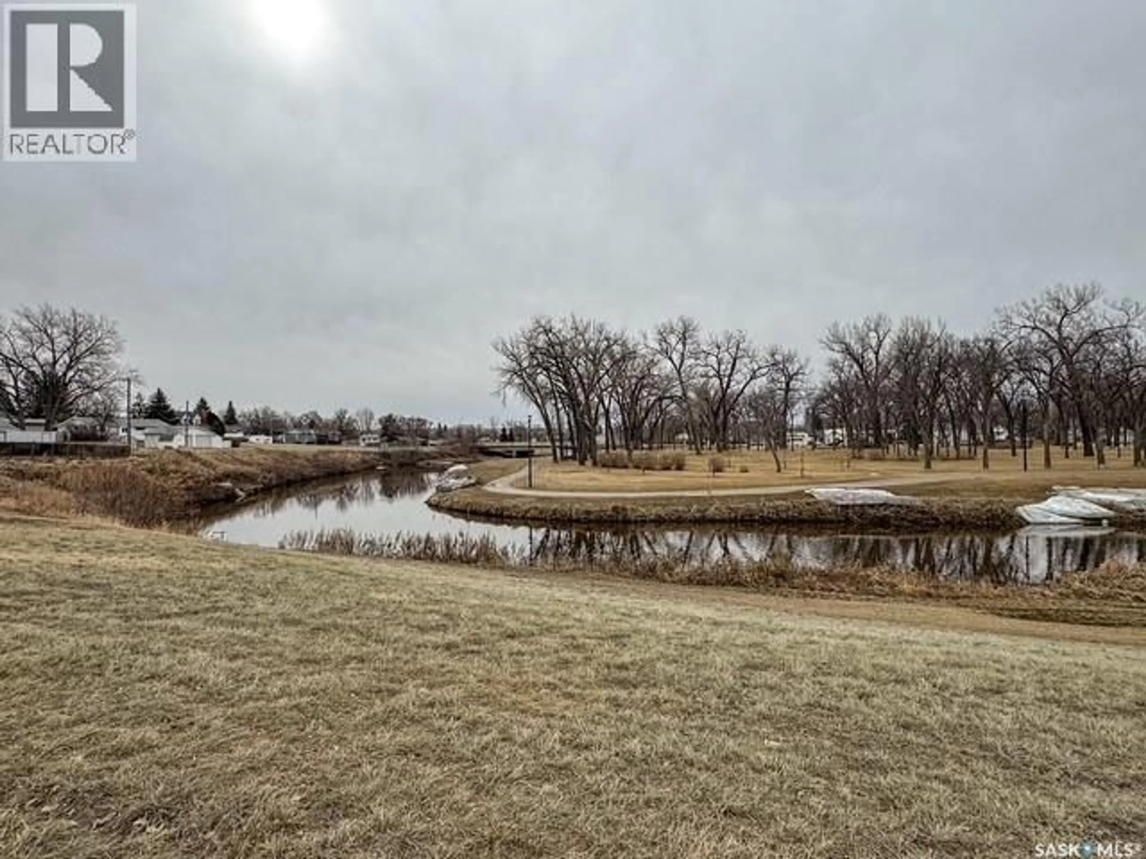 A pic from outside/outdoor area/front of a property/back of a property/a pic from drone, water/lake/river/ocean view for 947 & 957 CONNAUGHT DRIVE, Swift Current Saskatchewan S9H1R9