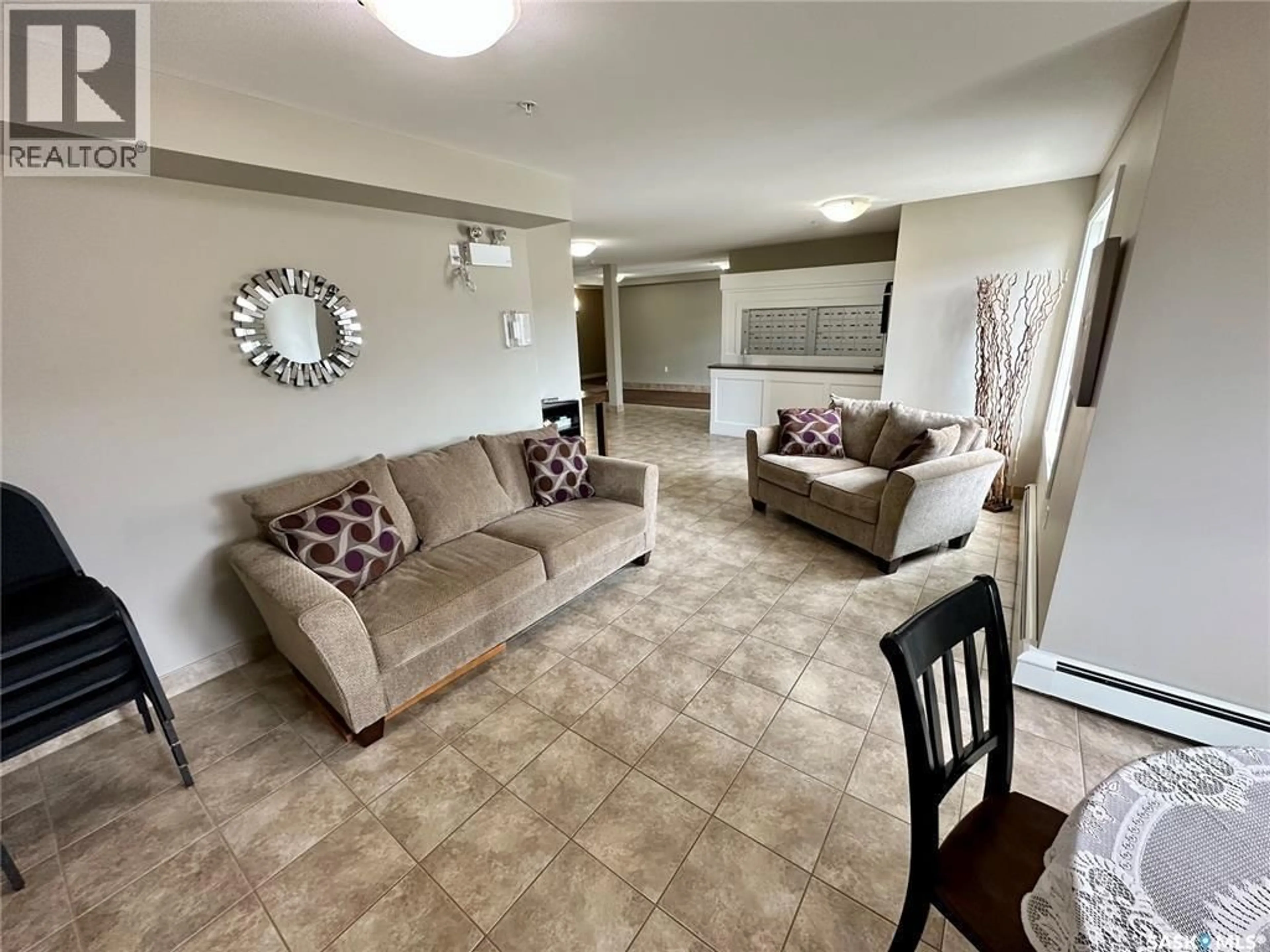 Living room with furniture, unknown for NE - 205 820 5TH STREET, Weyburn Saskatchewan S4H2V2