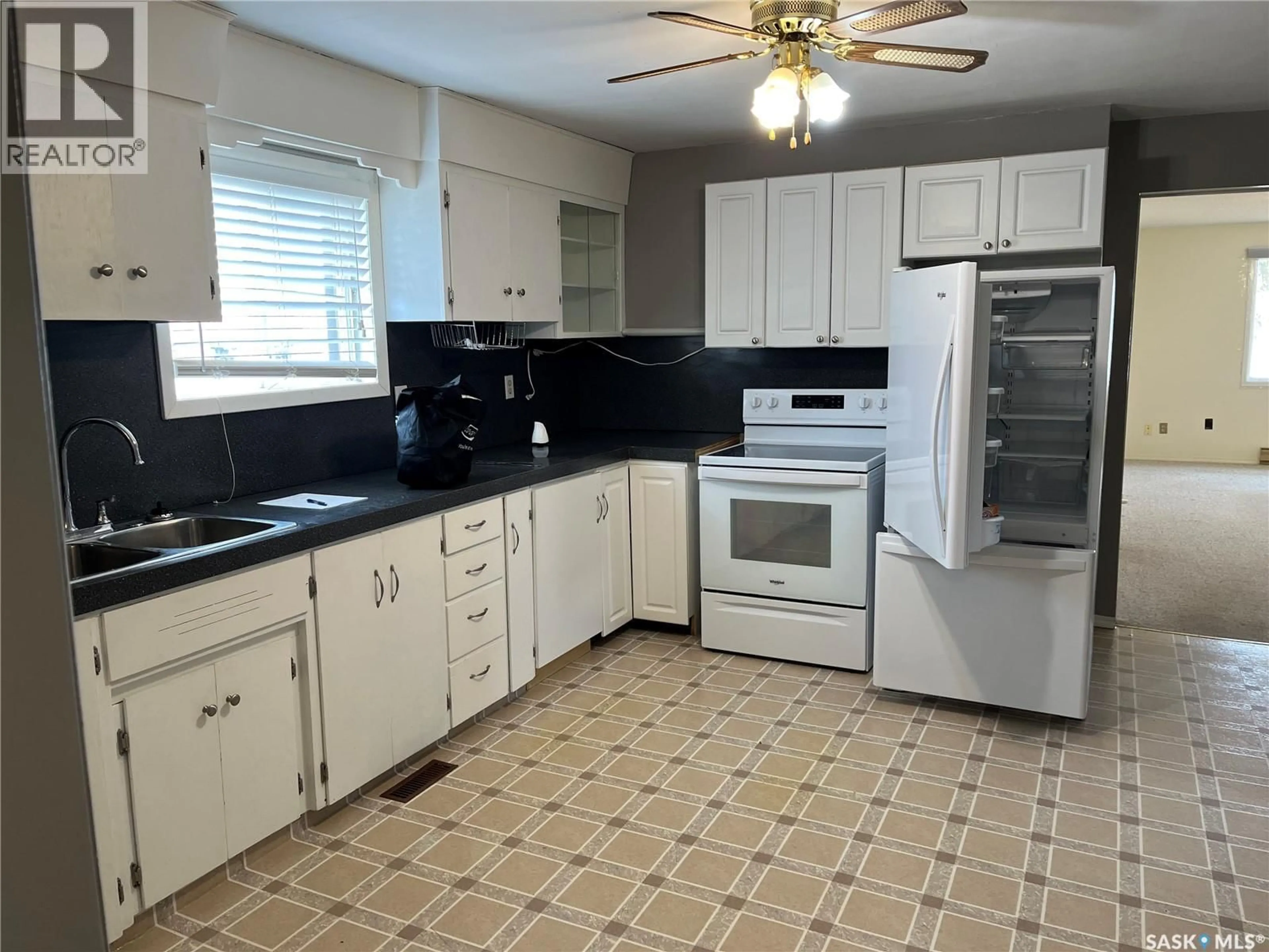 Standard kitchen, ceramic/tile floor for 101 1ST STREET, Lafleche Saskatchewan S0H2K0
