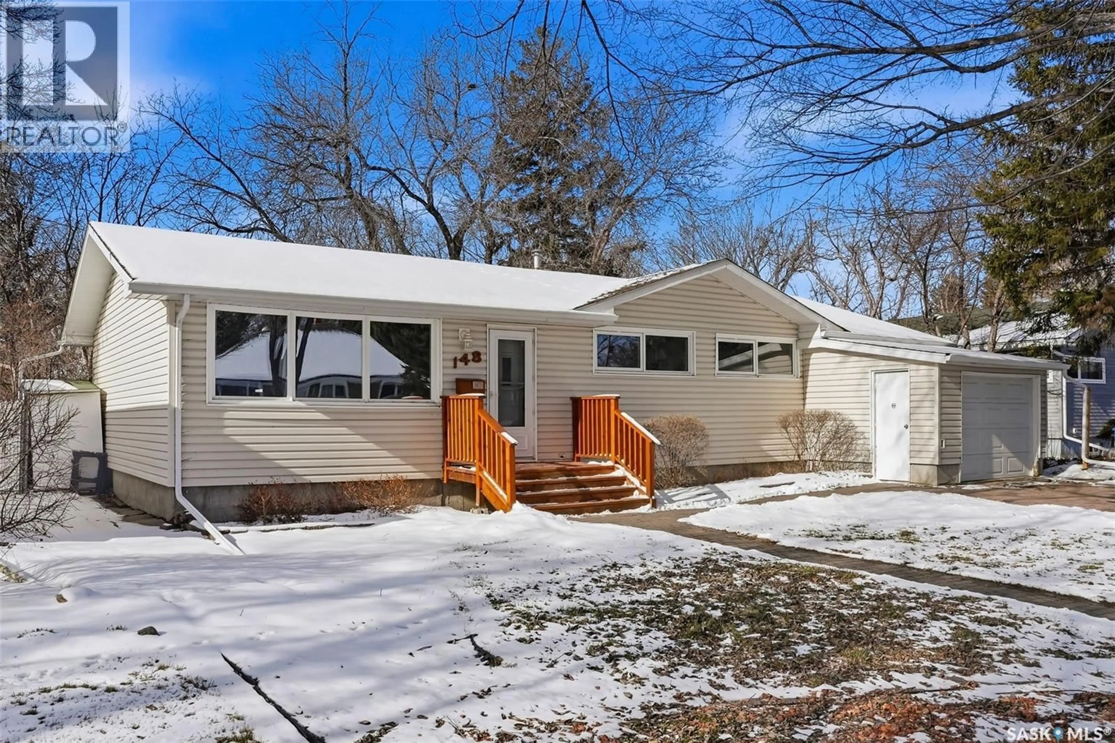 Home with vinyl exterior material, street for 148 MARSH CRESCENT, Regina Saskatchewan S4S5J7