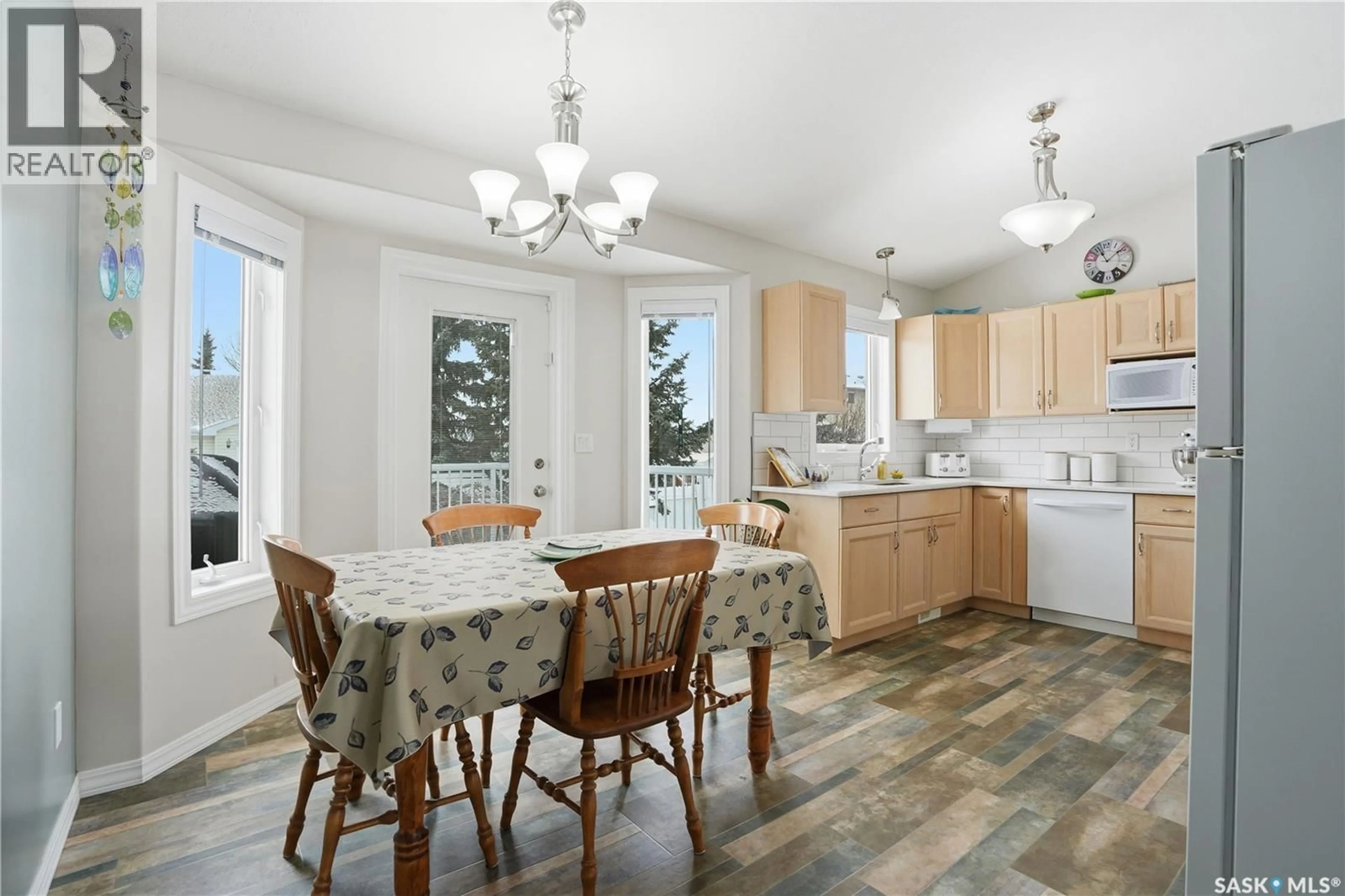 Open concept kitchen, ceramic/tile floor for 1002 PEZER CRESCENT, Saskatoon Saskatchewan S7S1K1