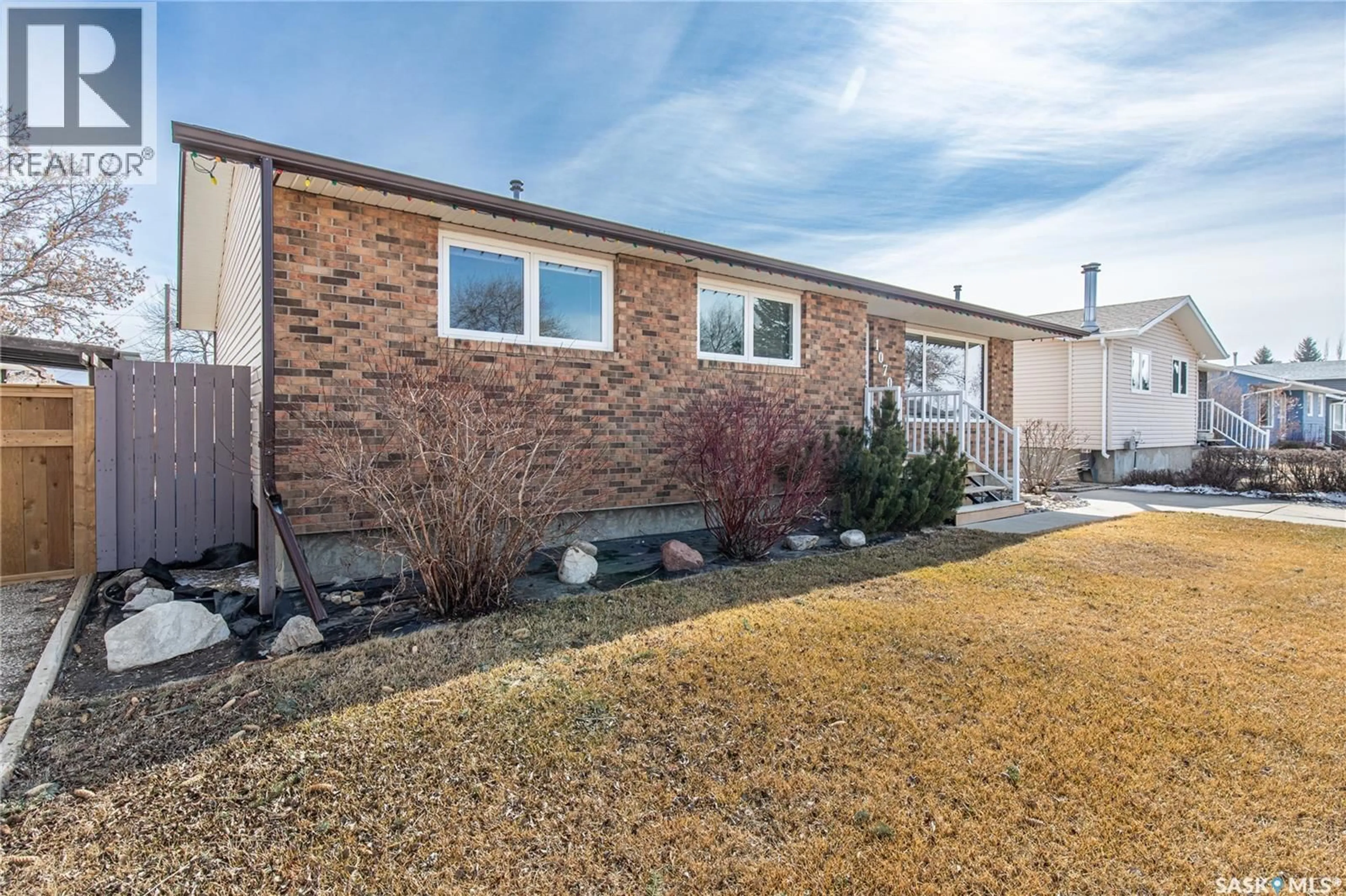 Home with brick exterior material, street for 1070 CORMAN CRESCENT, Moose Jaw Saskatchewan S6H6W1