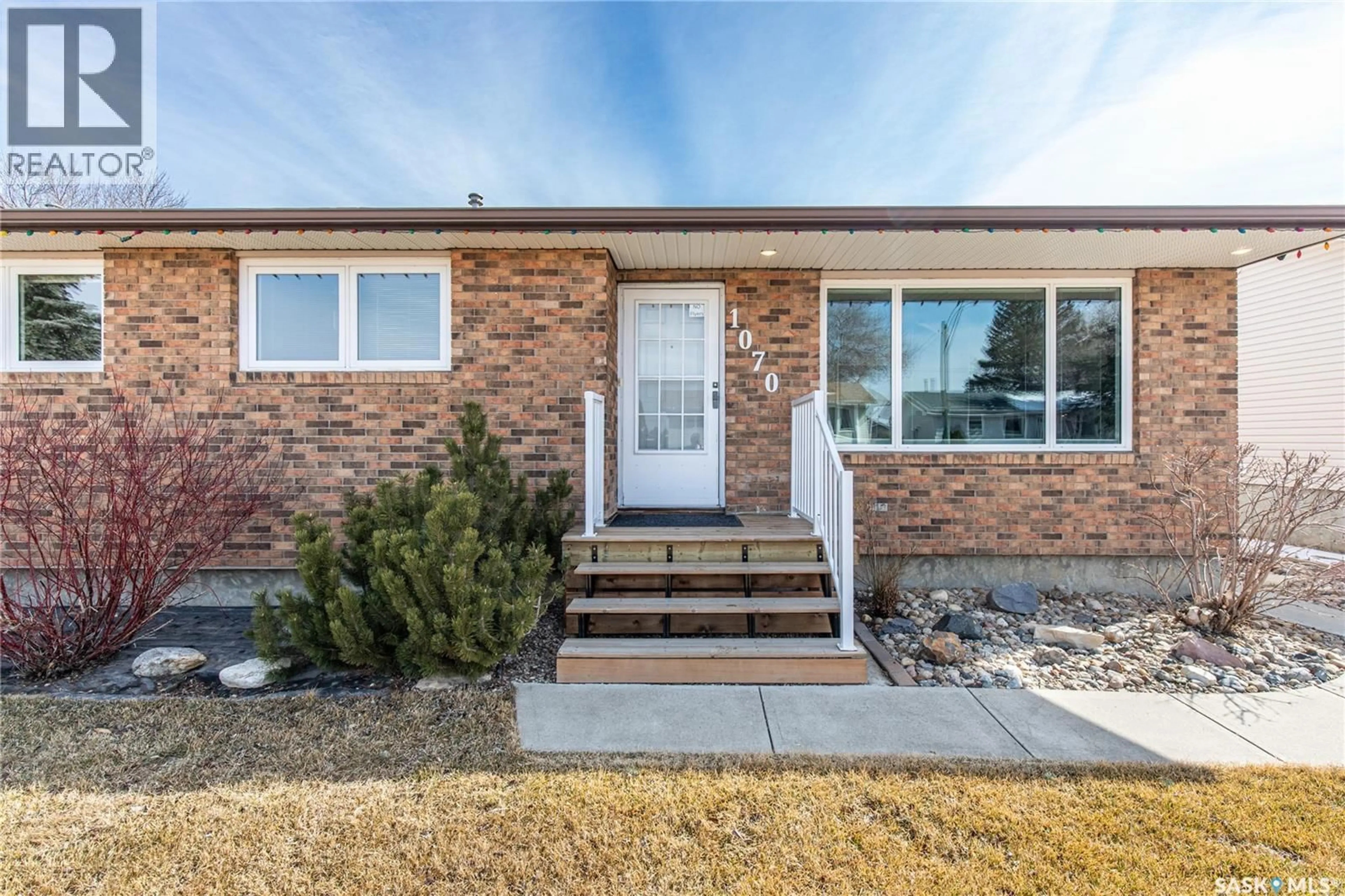 Home with brick exterior material, street for 1070 CORMAN CRESCENT, Moose Jaw Saskatchewan S6H6W1