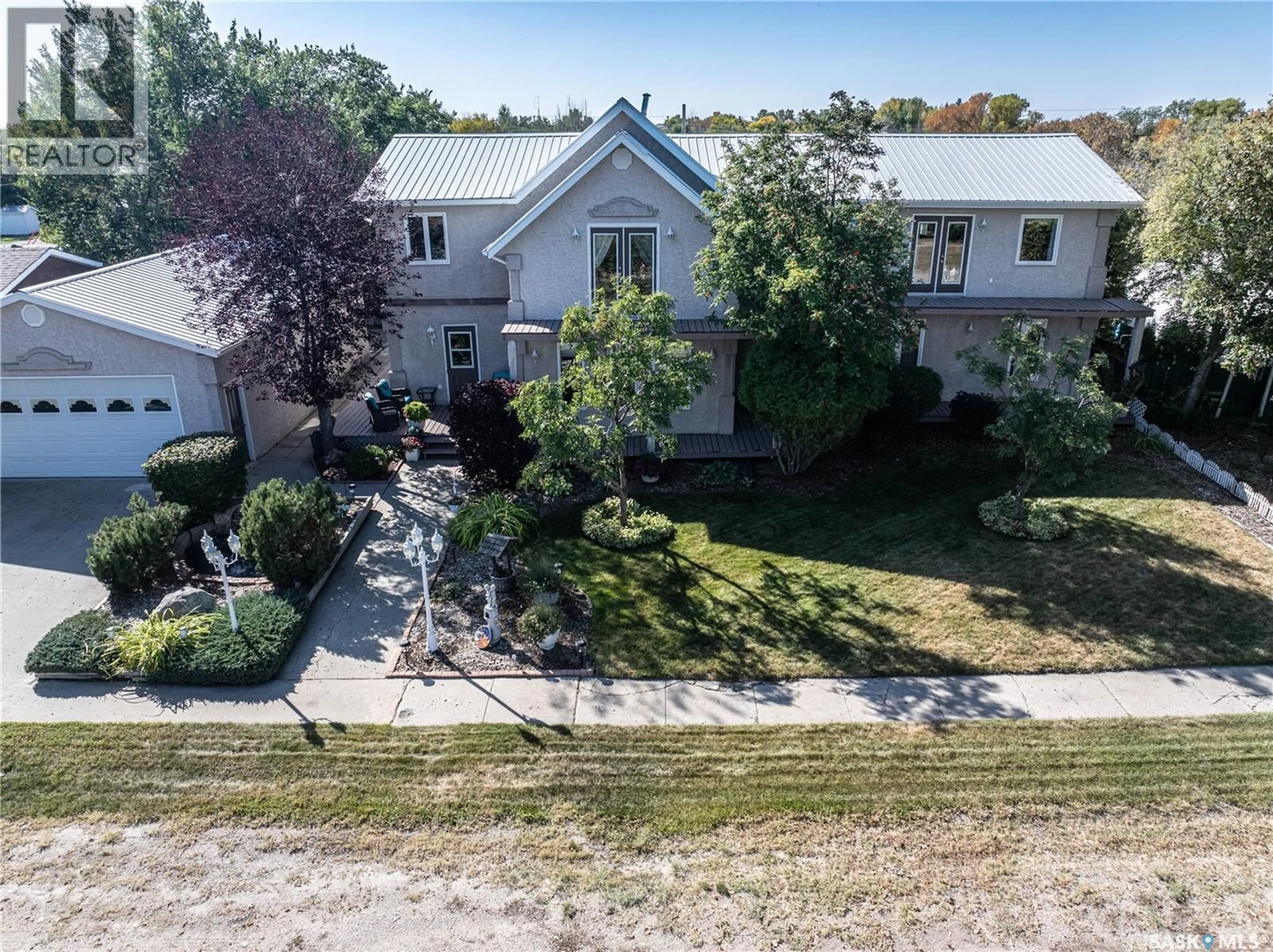 A pic from outside/outdoor area/front of a property/back of a property/a pic from drone, street for 304 1ST STREET, Milden Saskatchewan S0L2L0