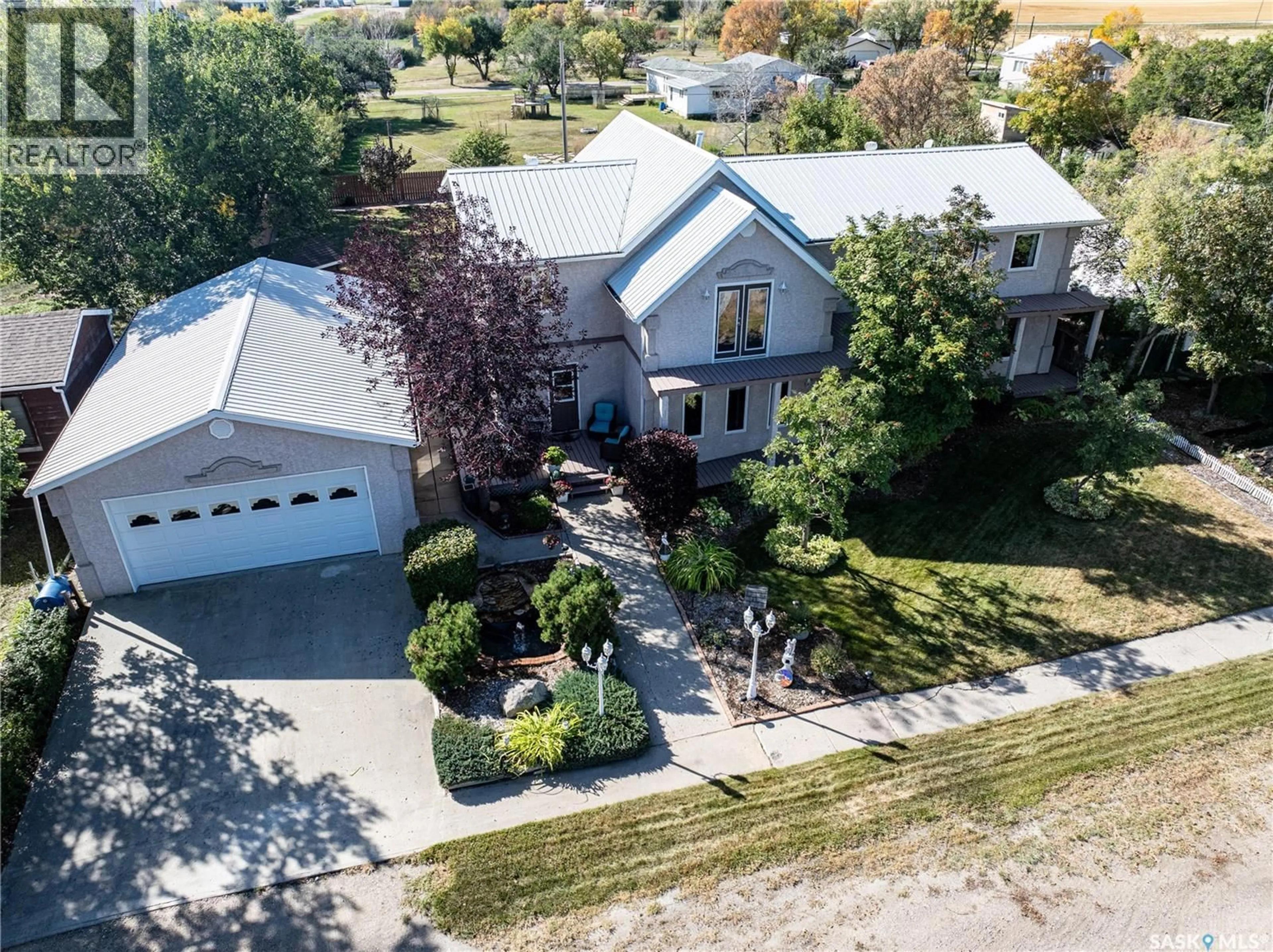 A pic from outside/outdoor area/front of a property/back of a property/a pic from drone, street for 304 1ST STREET, Milden Saskatchewan S0L2L0