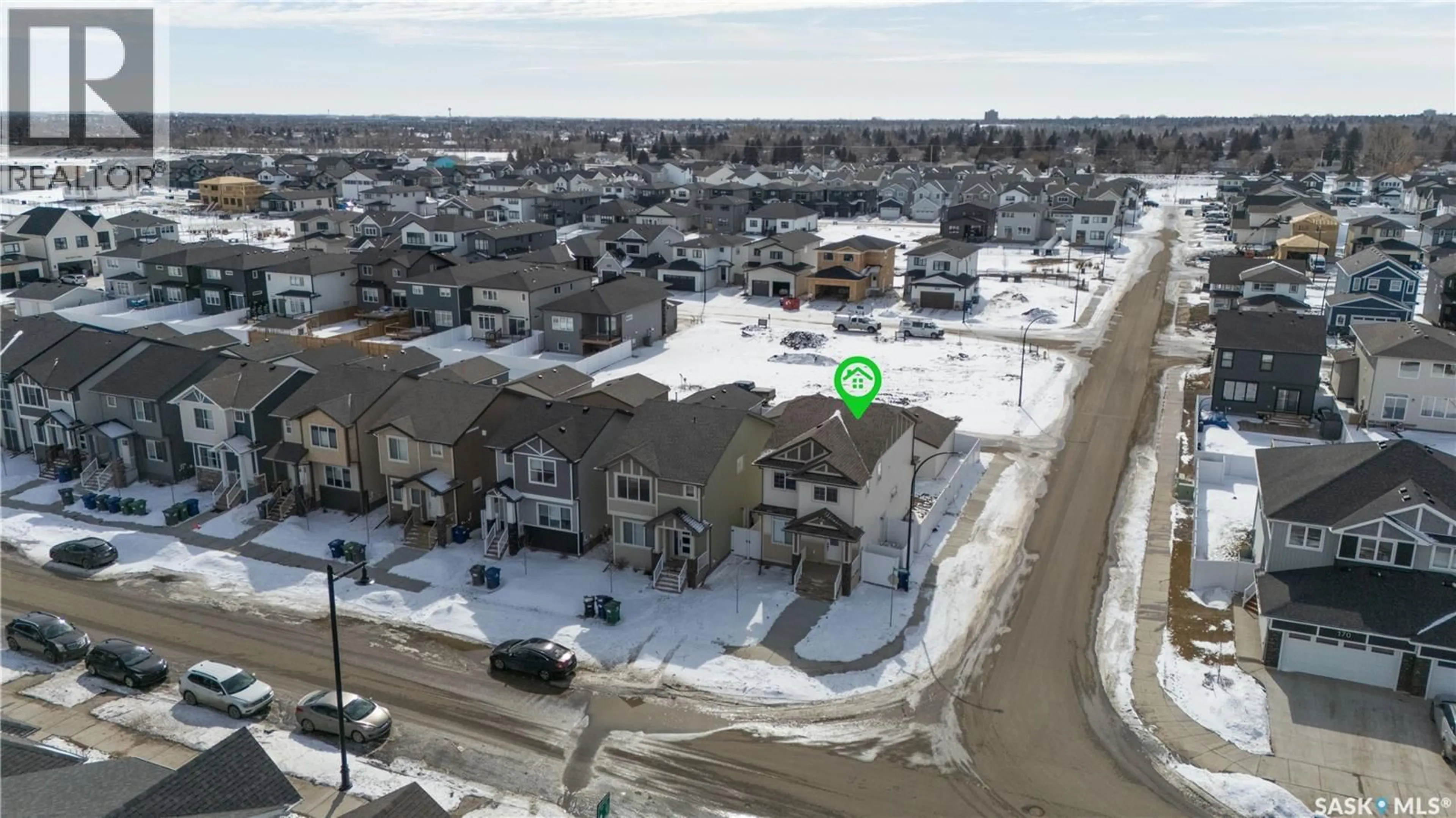 A pic from outside/outdoor area/front of a property/back of a property/a pic from drone, street for 202 COWESSESS ROAD, Saskatoon Saskatchewan S7V1T3