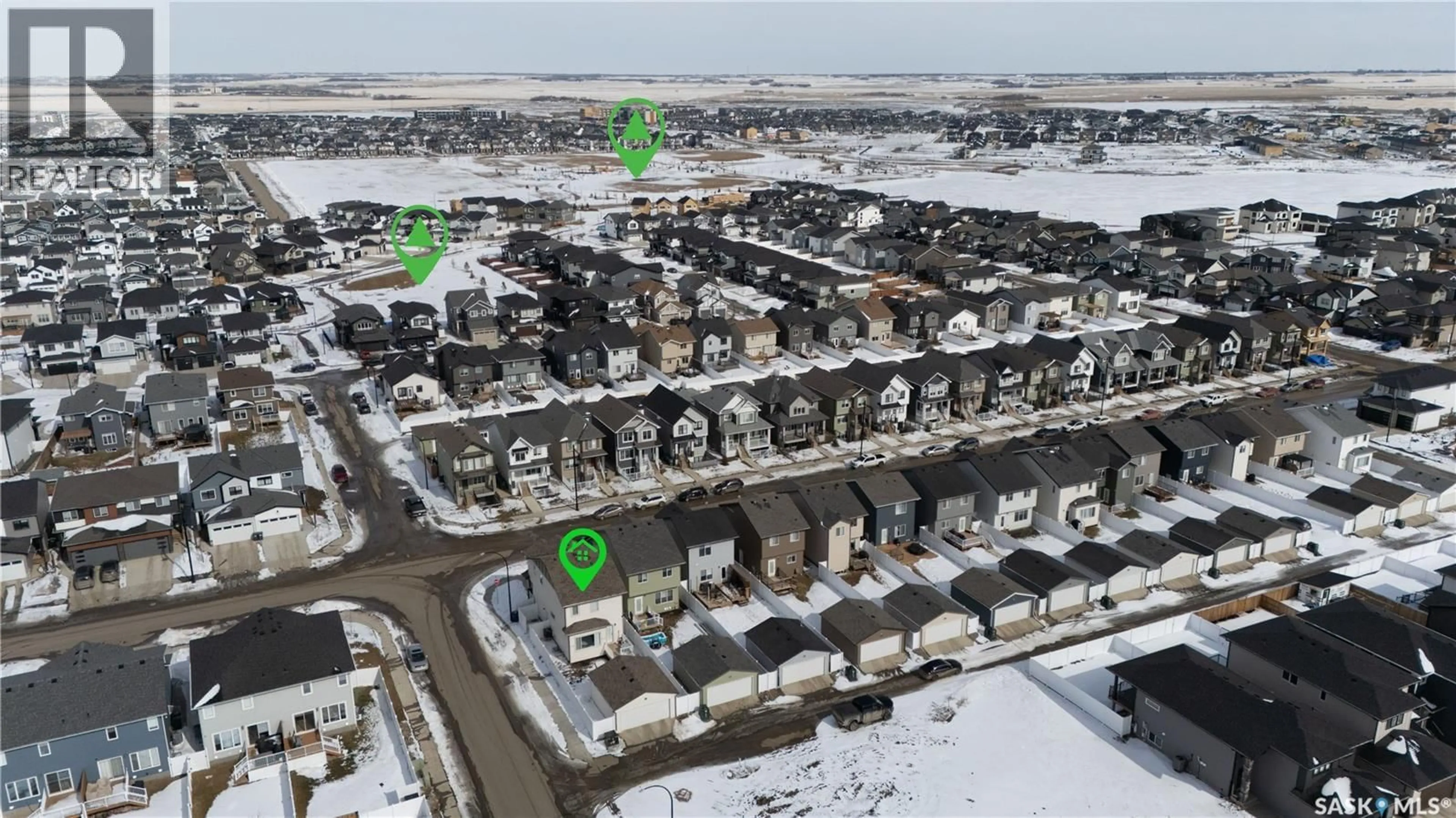 A pic from outside/outdoor area/front of a property/back of a property/a pic from drone, street for 202 COWESSESS ROAD, Saskatoon Saskatchewan S7V1T3