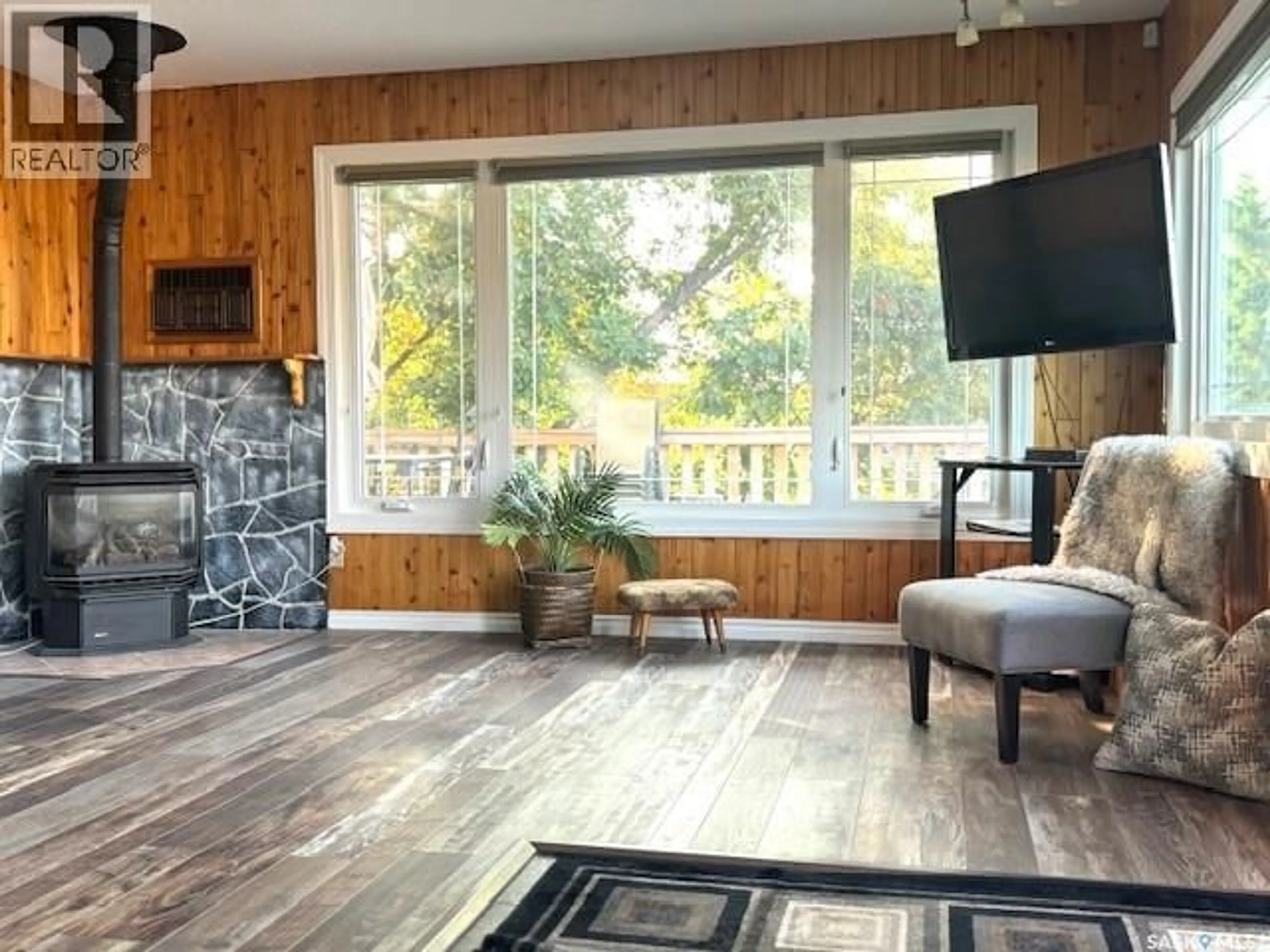 Living room with furniture, wood/laminate floor for 24 HIGHLAND AVENUE, Meota Rm No.468 Saskatchewan S0M0L0