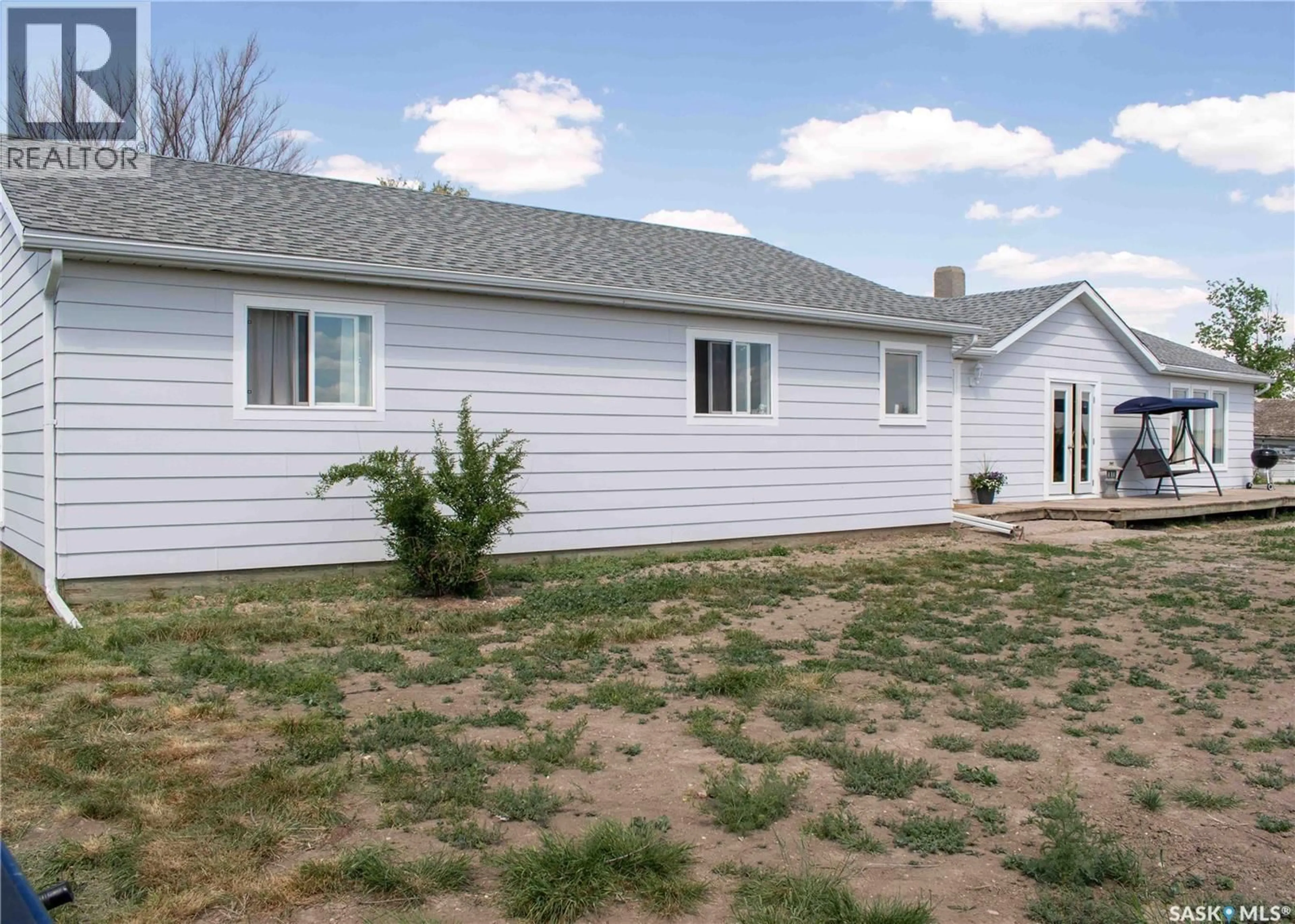 Home with vinyl exterior material, street for BURKHALTER RD, Monet Rm No. 257 Saskatchewan S0L0Z0