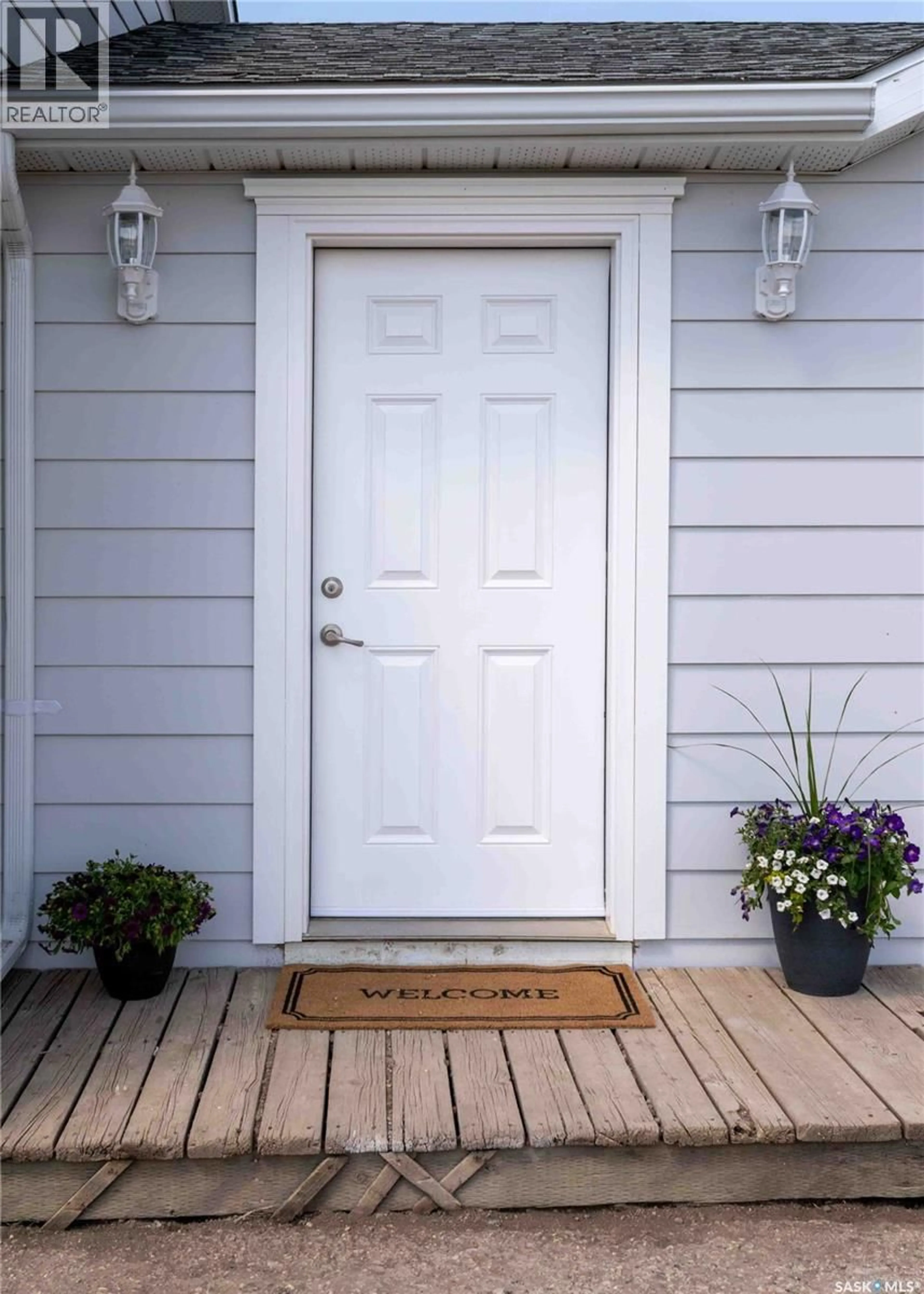 Home with vinyl exterior material, street for BURKHALTER RD, Monet Rm No. 257 Saskatchewan S0L0Z0