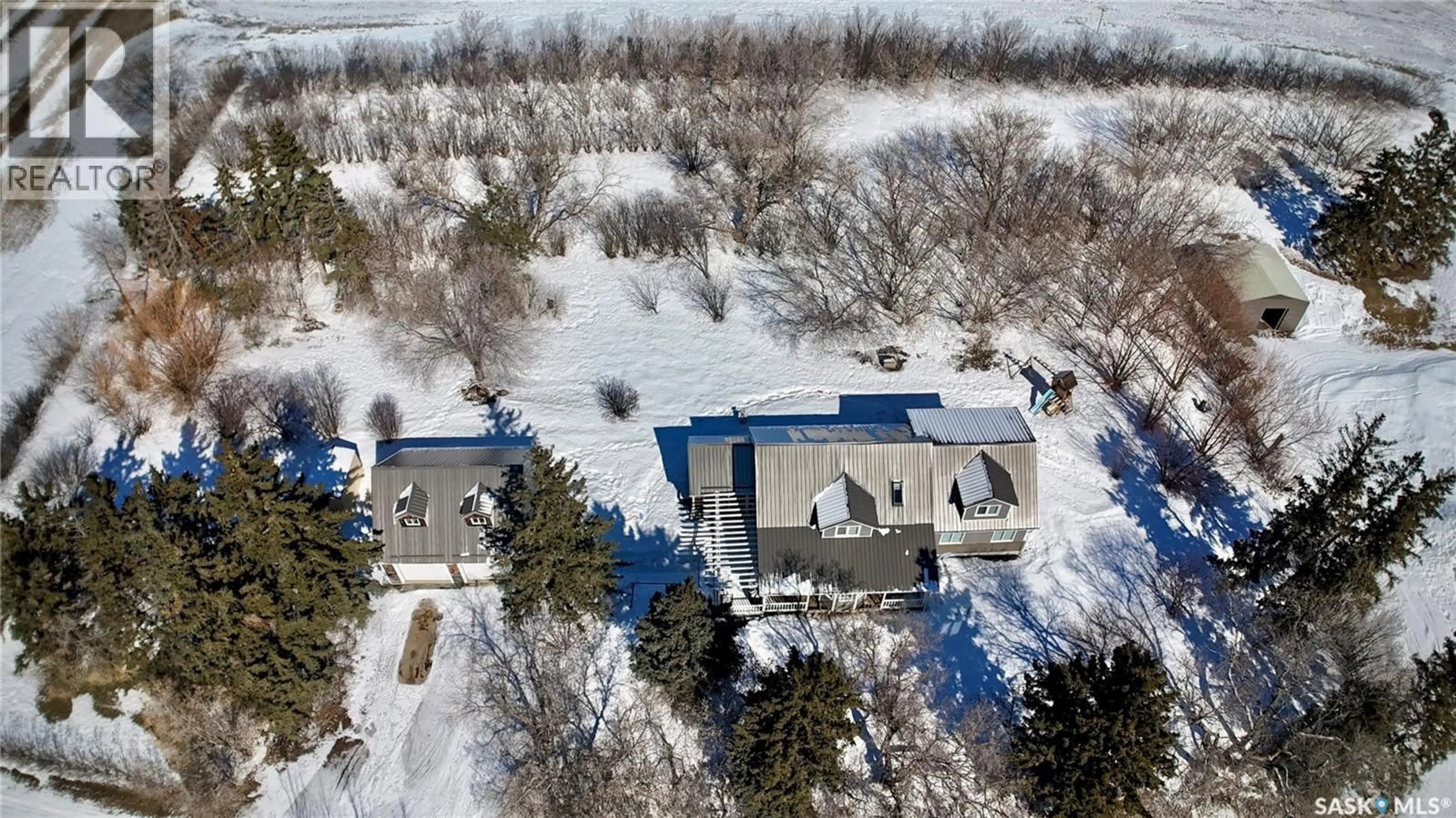 A pic from outside/outdoor area/front of a property/back of a property/a pic from drone, water/lake/river/ocean view for HAWCUTT ACREAGE, Grayson Rm No. 184 Saskatchewan S0A3Y0