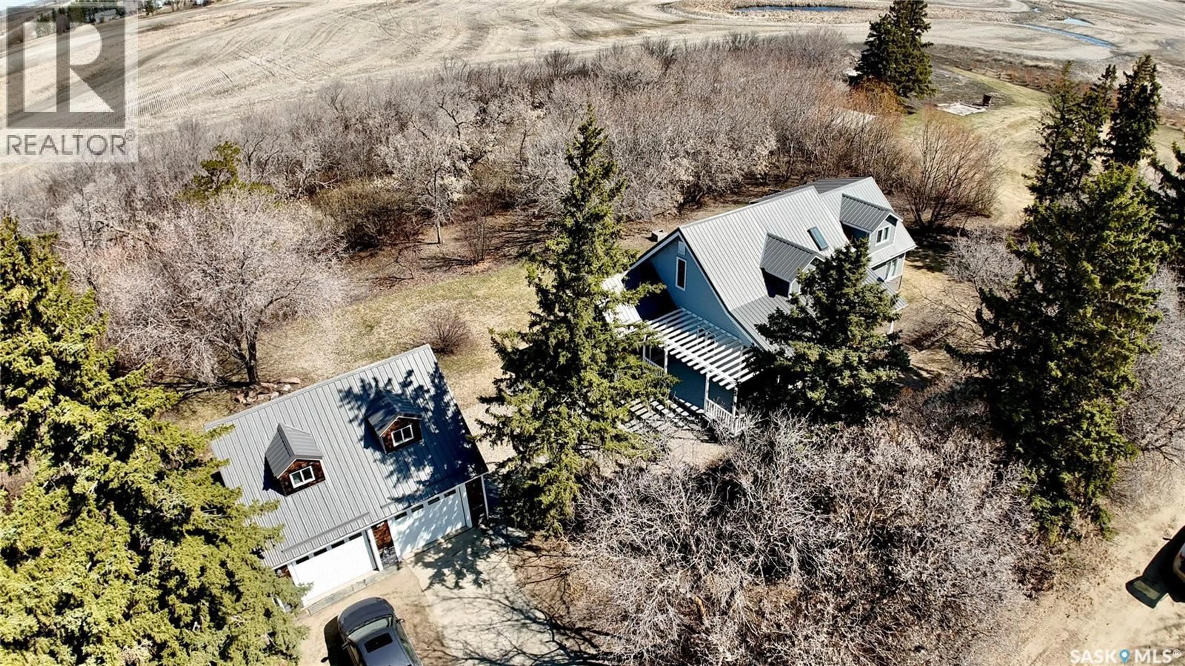 A pic from outside/outdoor area/front of a property/back of a property/a pic from drone, street for HAWCUTT ACREAGE, Grayson Rm No. 184 Saskatchewan S0A3Y0