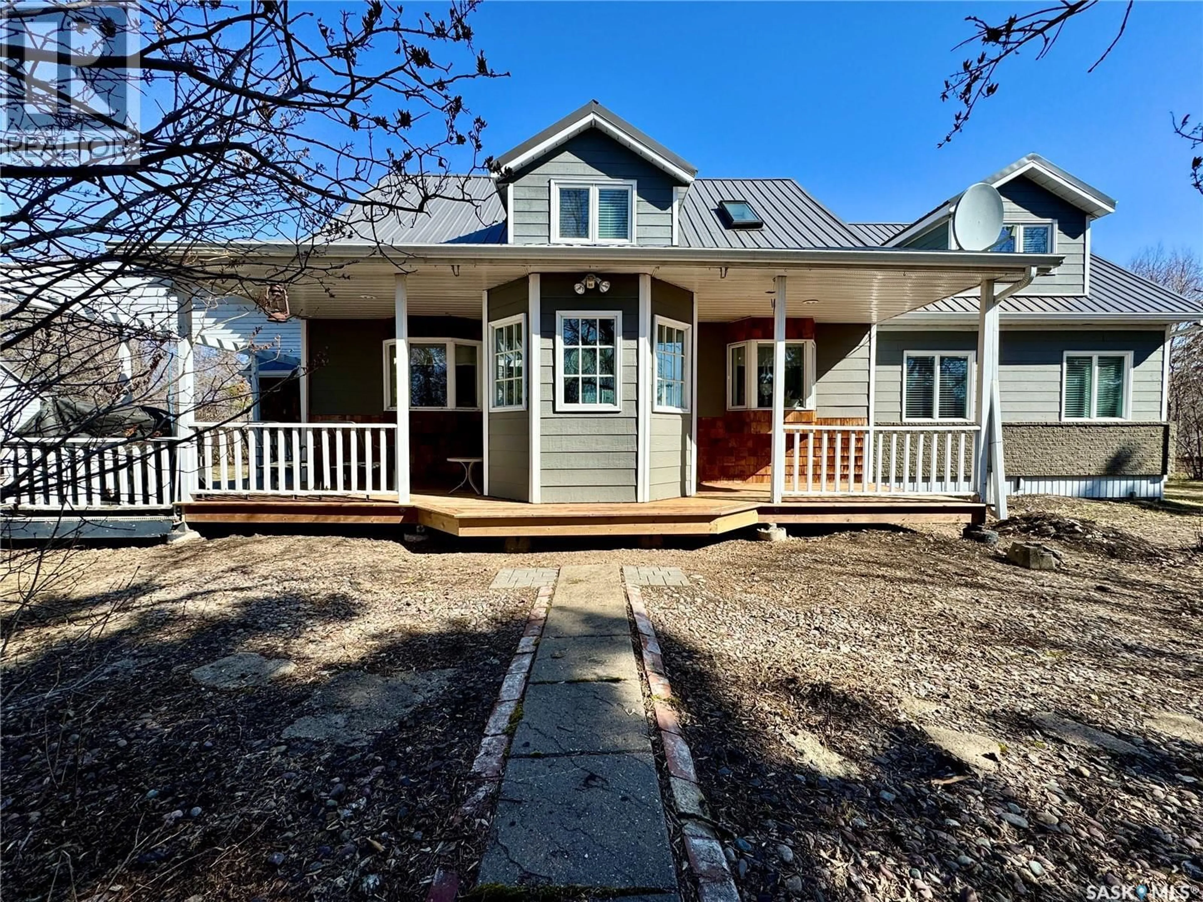Home with vinyl exterior material, street for HAWCUTT ACREAGE, Grayson Rm No. 184 Saskatchewan S0A3Y0
