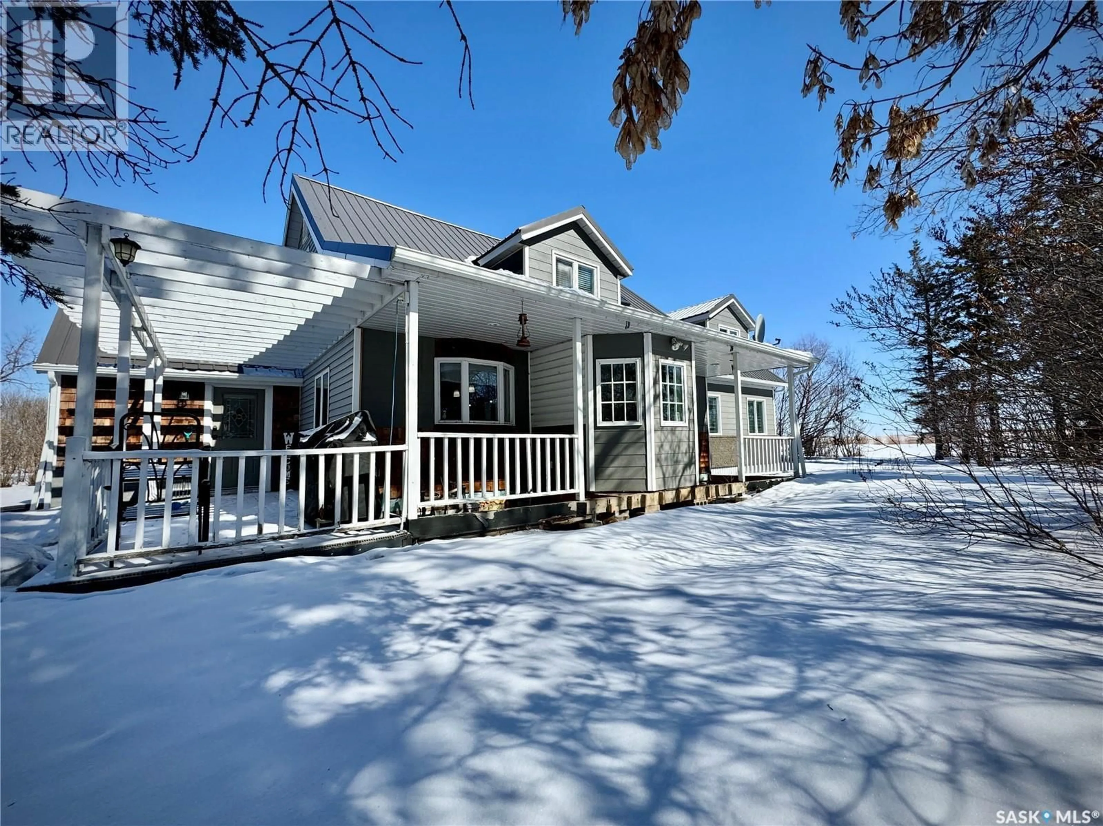 Home with vinyl exterior material, street for HAWCUTT ACREAGE, Grayson Rm No. 184 Saskatchewan S0A3Y0