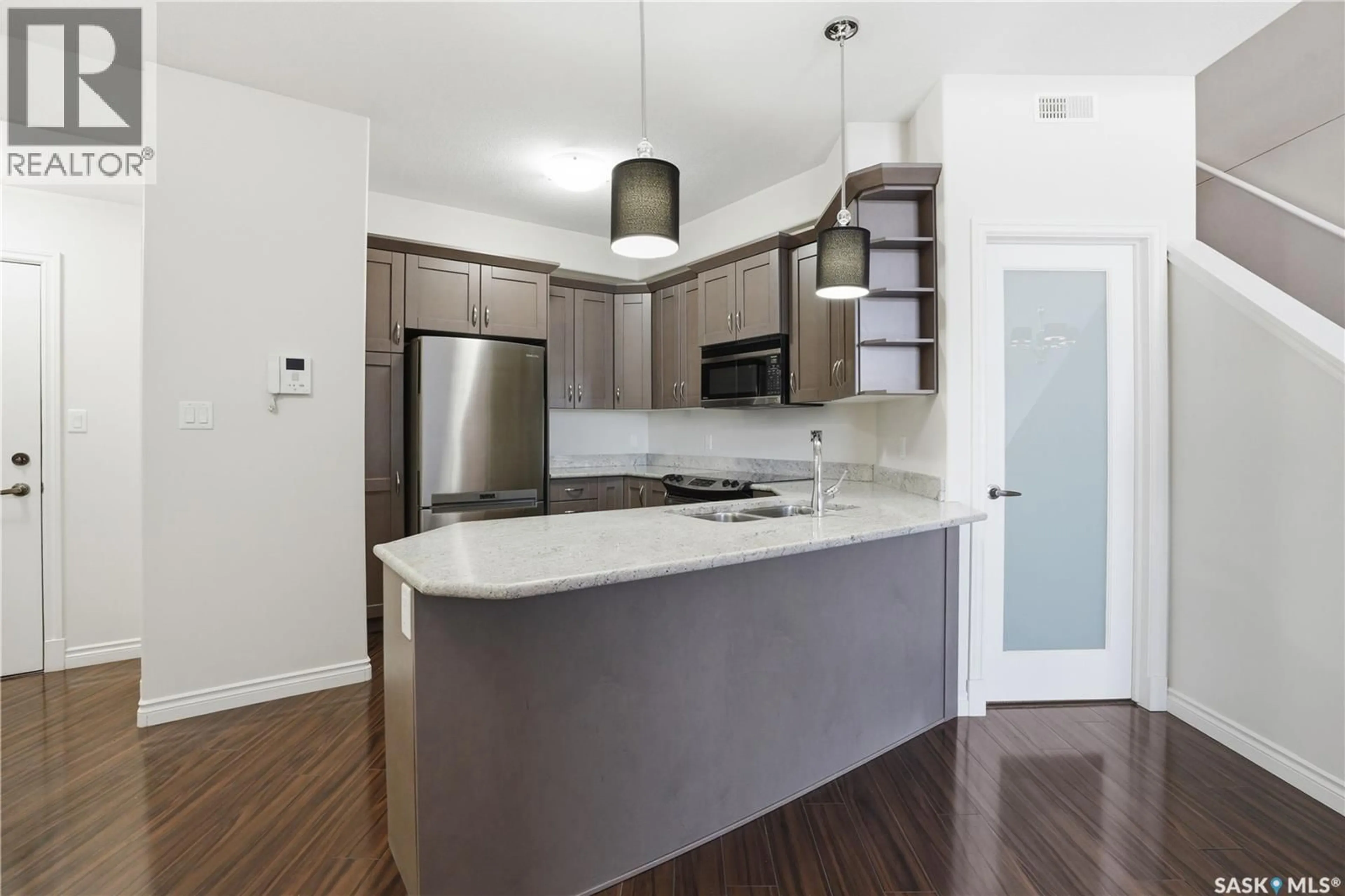 Open concept kitchen, unknown for 301 - 2730 MAIN STREET, Saskatoon Saskatchewan S7H0M3