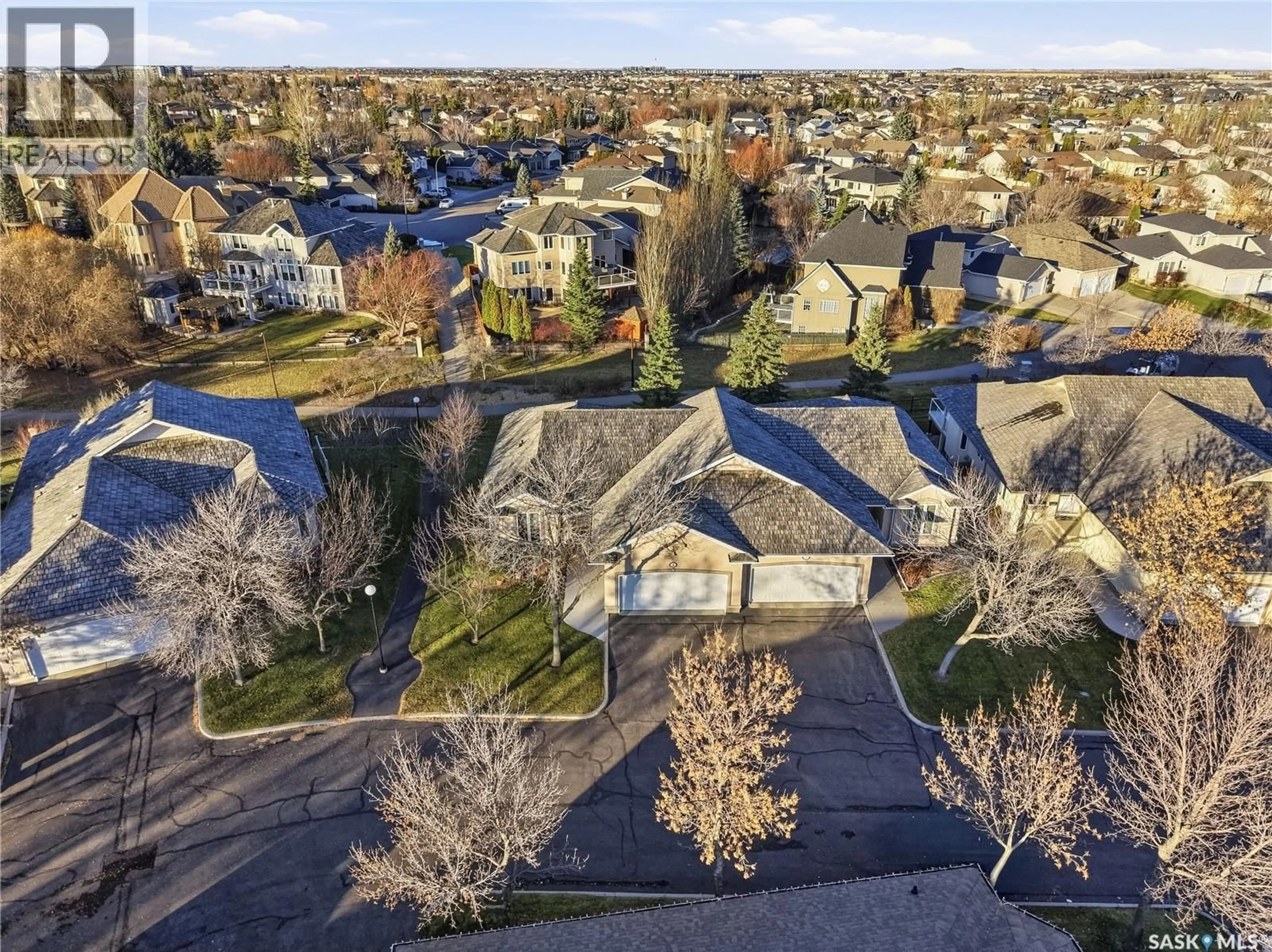 A pic from outside/outdoor area/front of a property/back of a property/a pic from drone, street for 4 STODOLA COURT, Saskatoon Saskatchewan S7N4N9