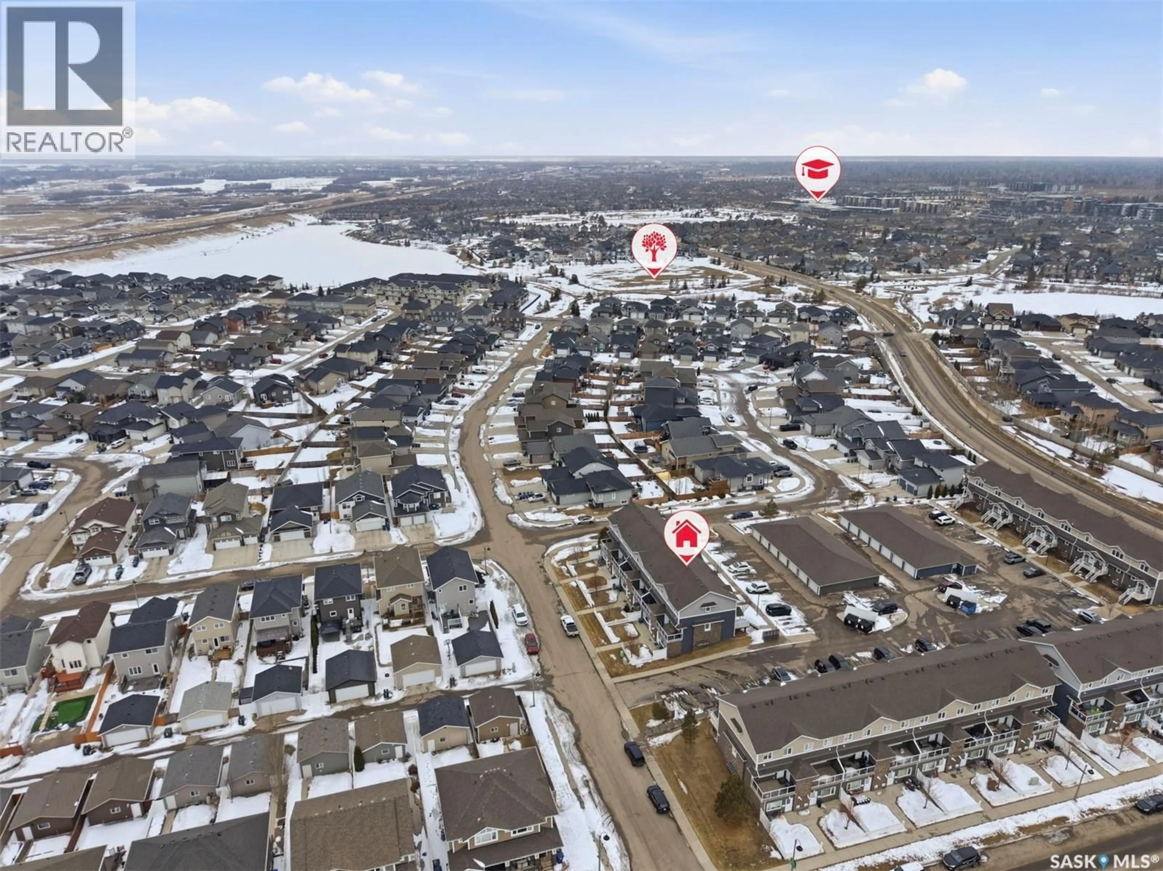A pic from outside/outdoor area/front of a property/back of a property/a pic from drone, water/lake/river/ocean view for 103 - 275 PRINGLE LANE, Saskatoon Saskatchewan S7T0T5