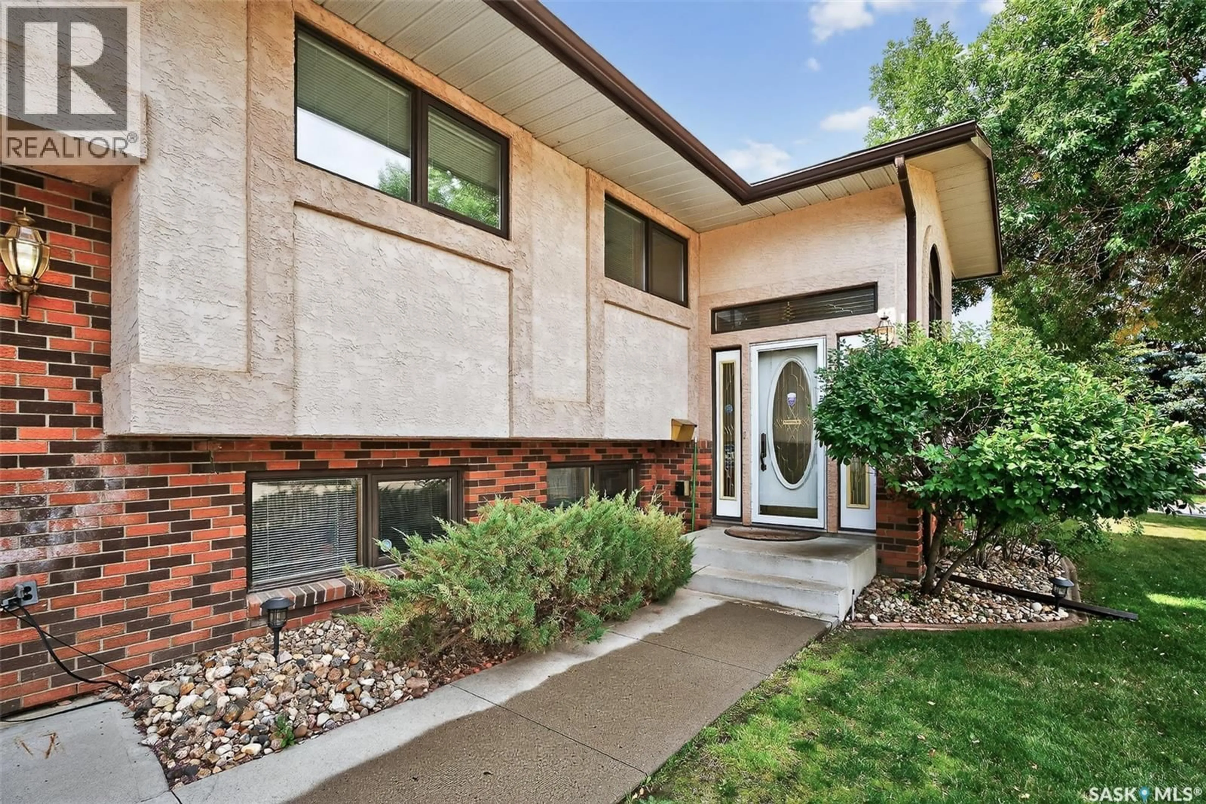 Home with brick exterior material, street for 80 BLUEBELL CRESCENT, Moose Jaw Saskatchewan S6J1A2