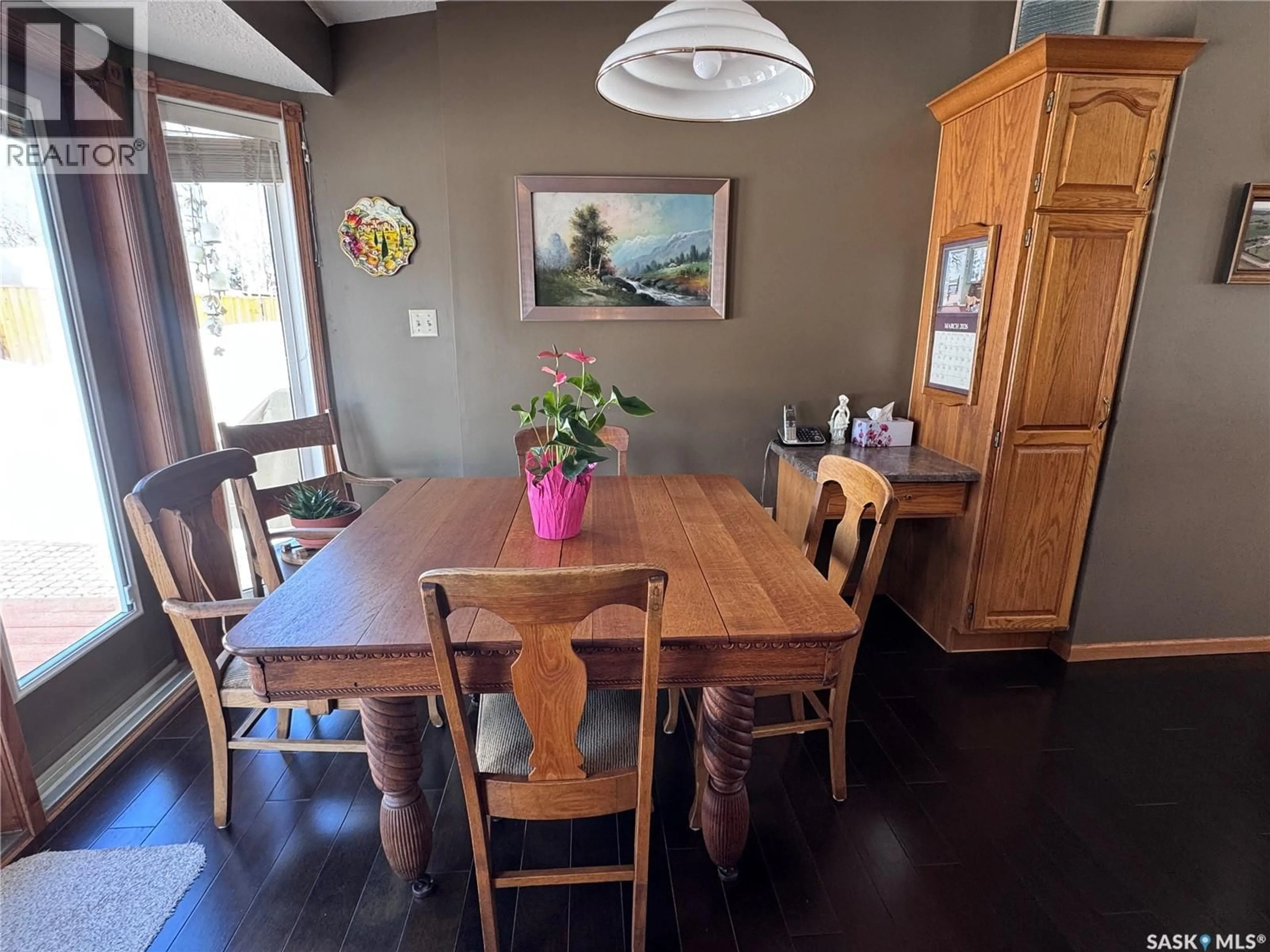 Dining room, wood/laminate floor for 930 SINOTTE CRESCENT, La Ronge Saskatchewan S0J1L0
